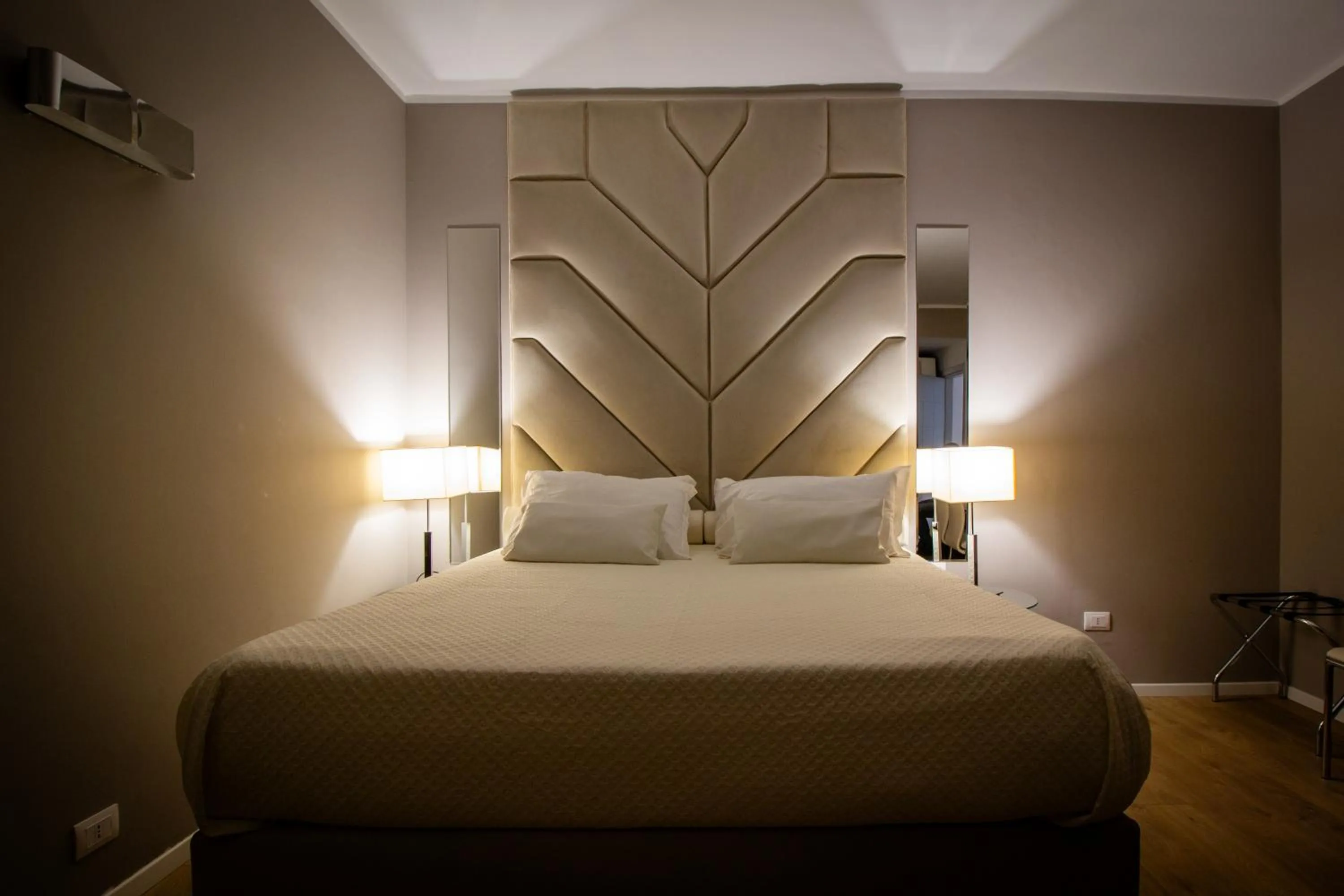 Bed in Album Boutique Rooms