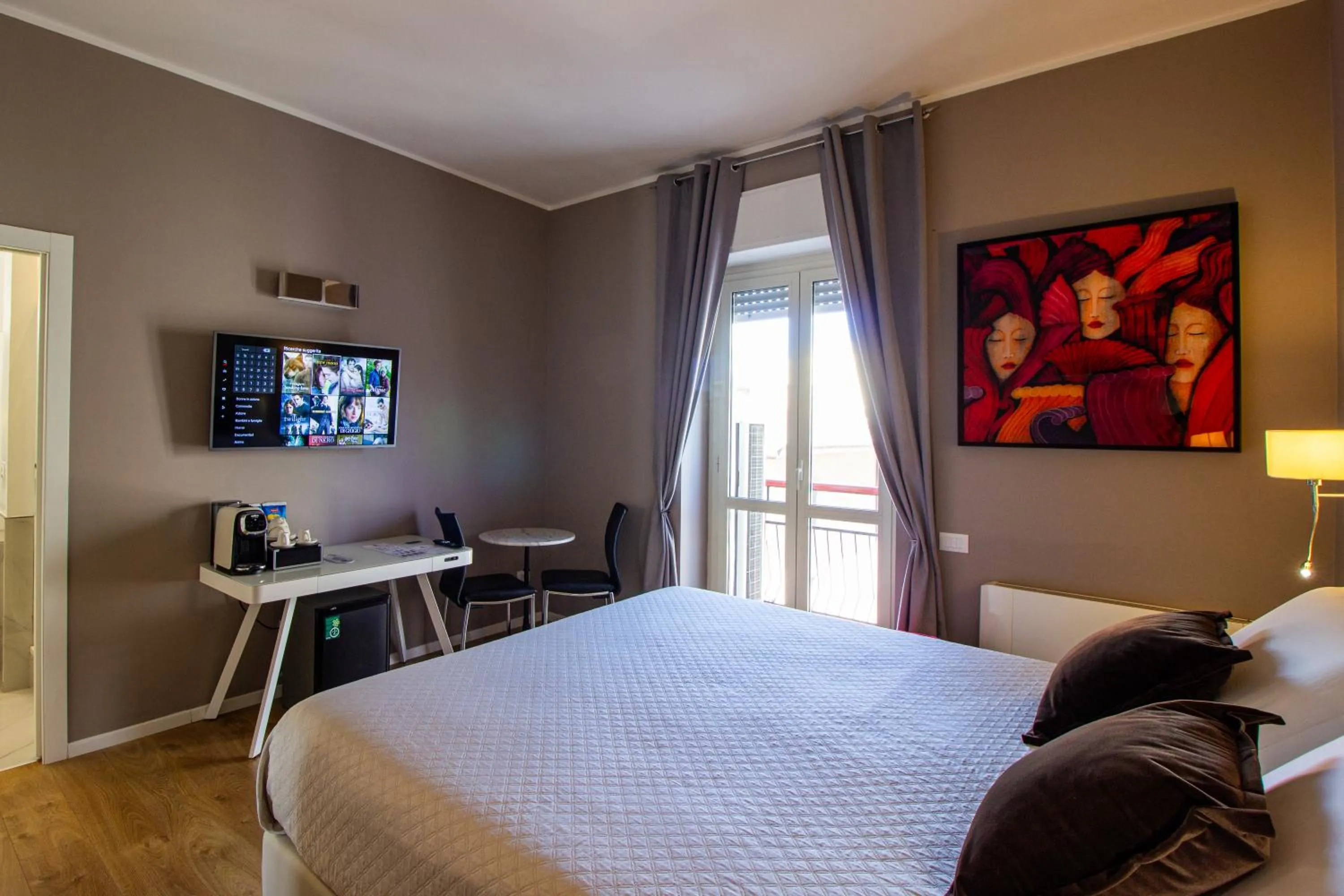 TV and multimedia, Bed in Album Boutique Rooms