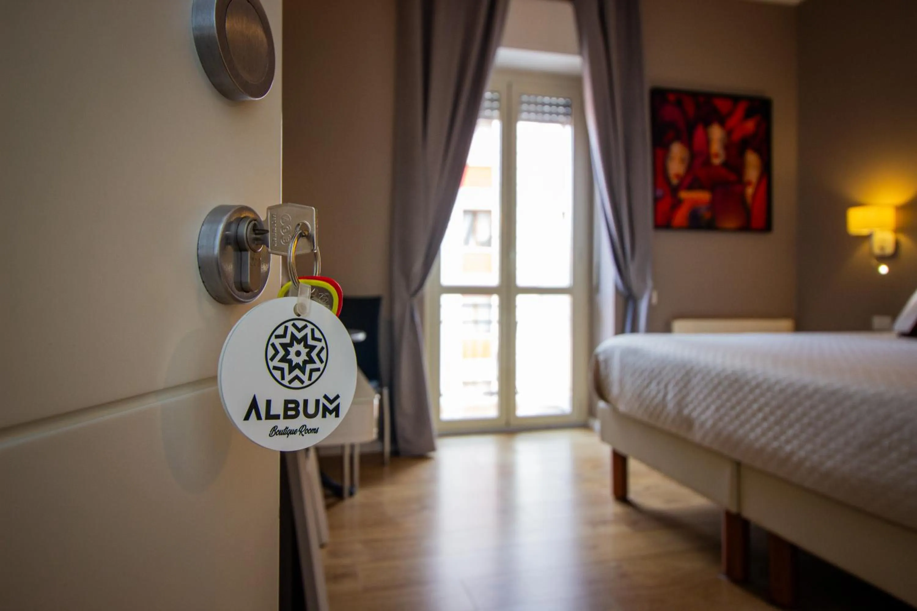 Logo/Certificate/Sign, Bed in Album Boutique Rooms