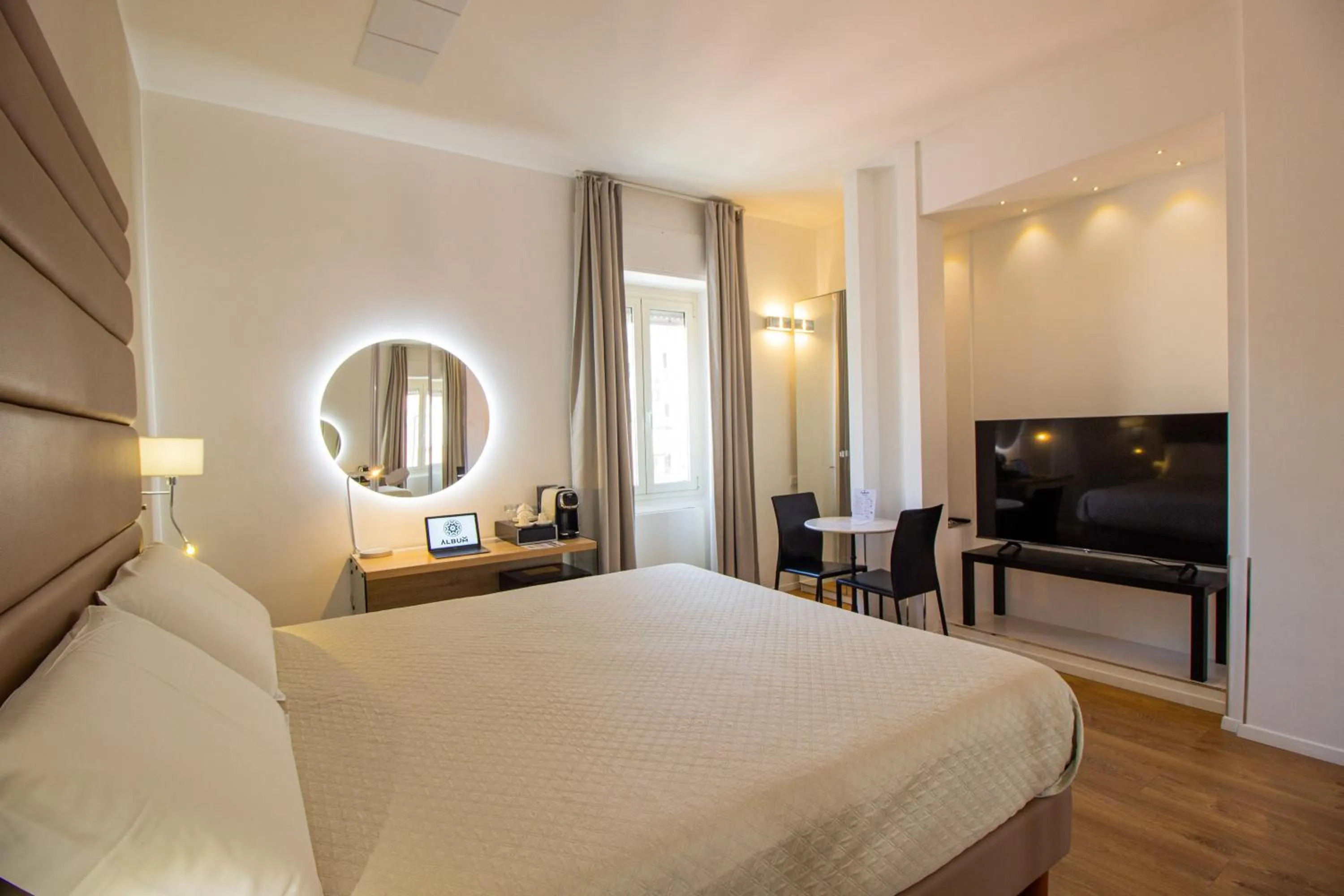 TV and multimedia, Bed in Album Boutique Rooms