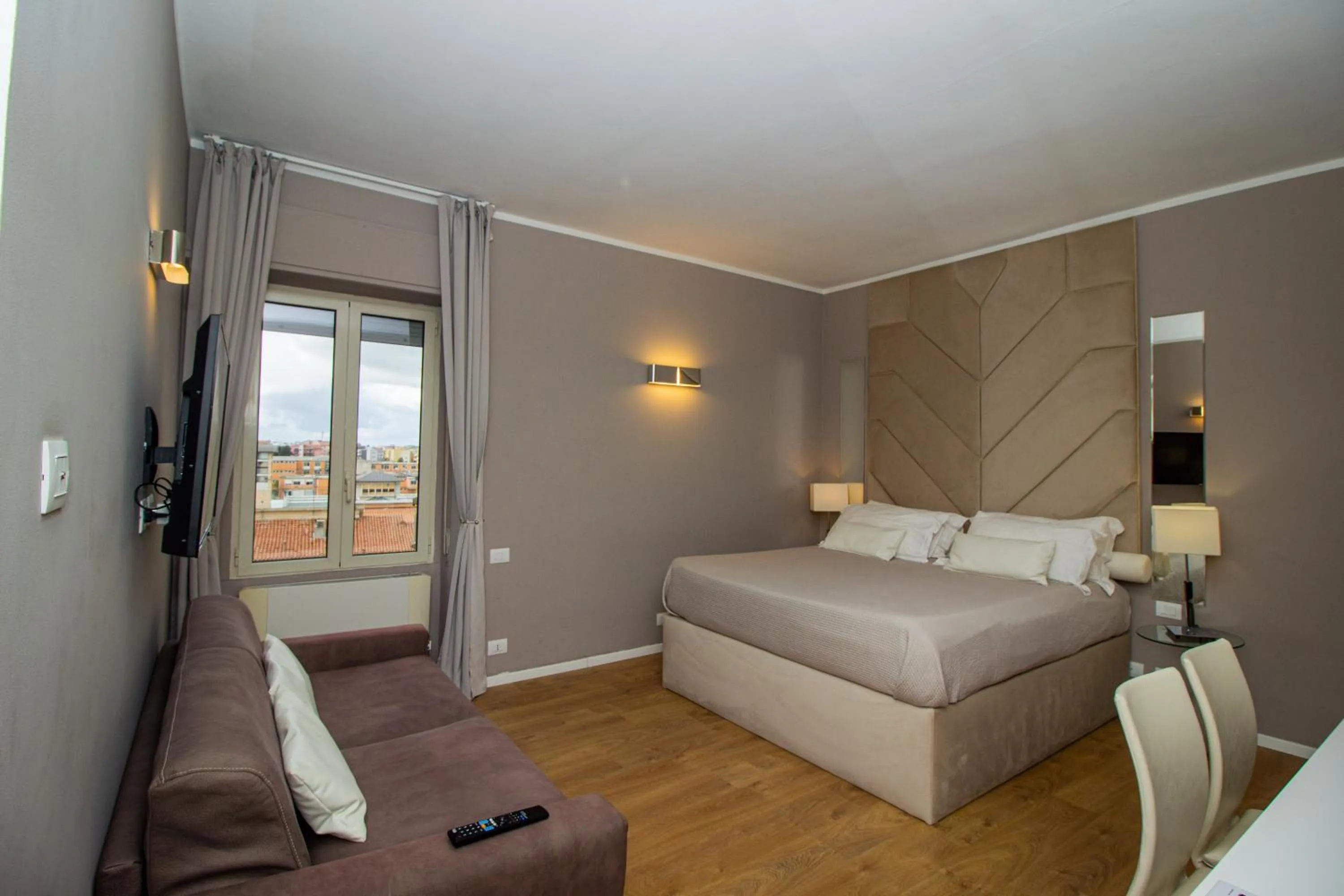 Photo of the whole room, Bed in Album Boutique Rooms