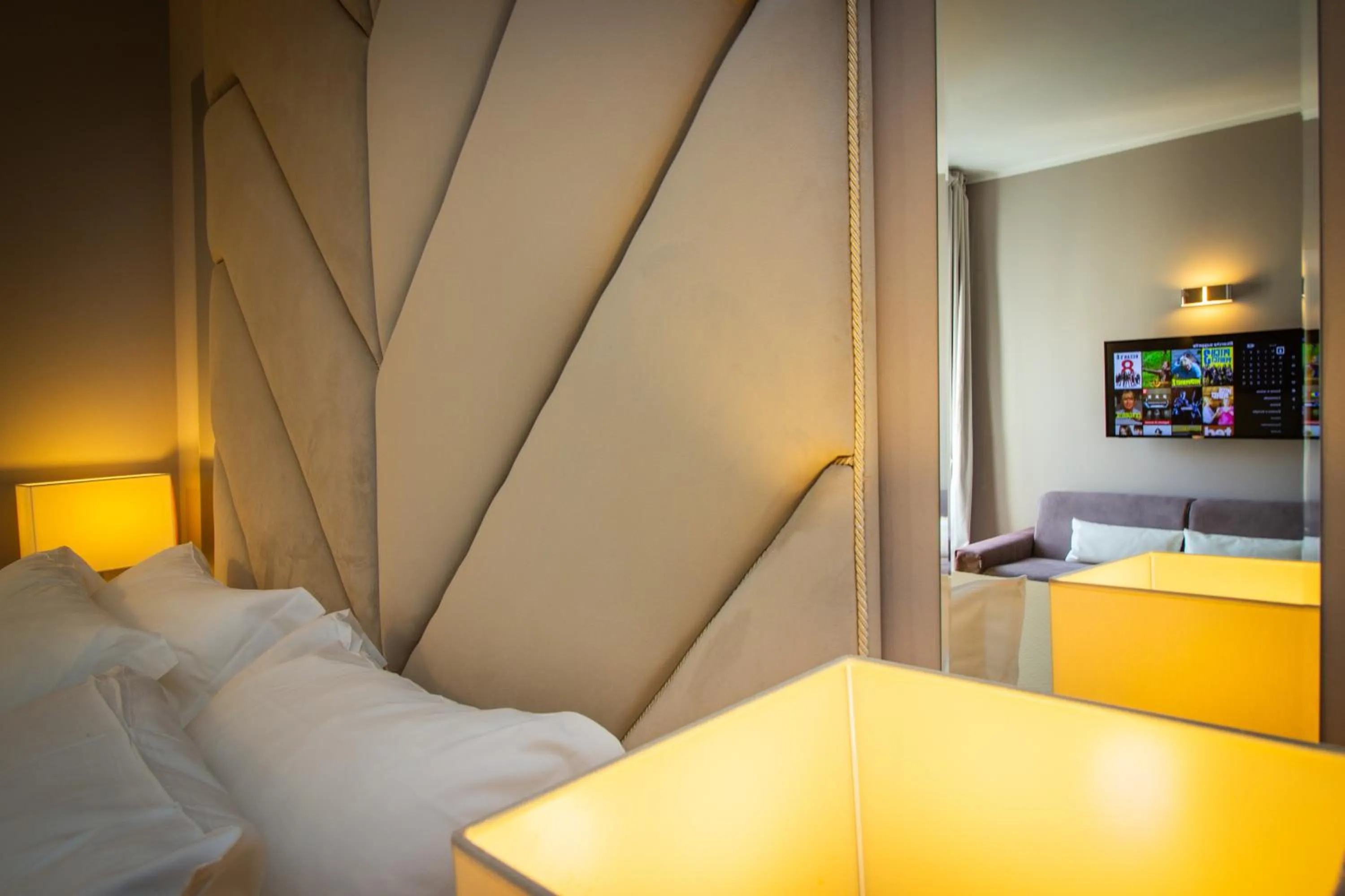 Decorative detail, Bed in Album Boutique Rooms