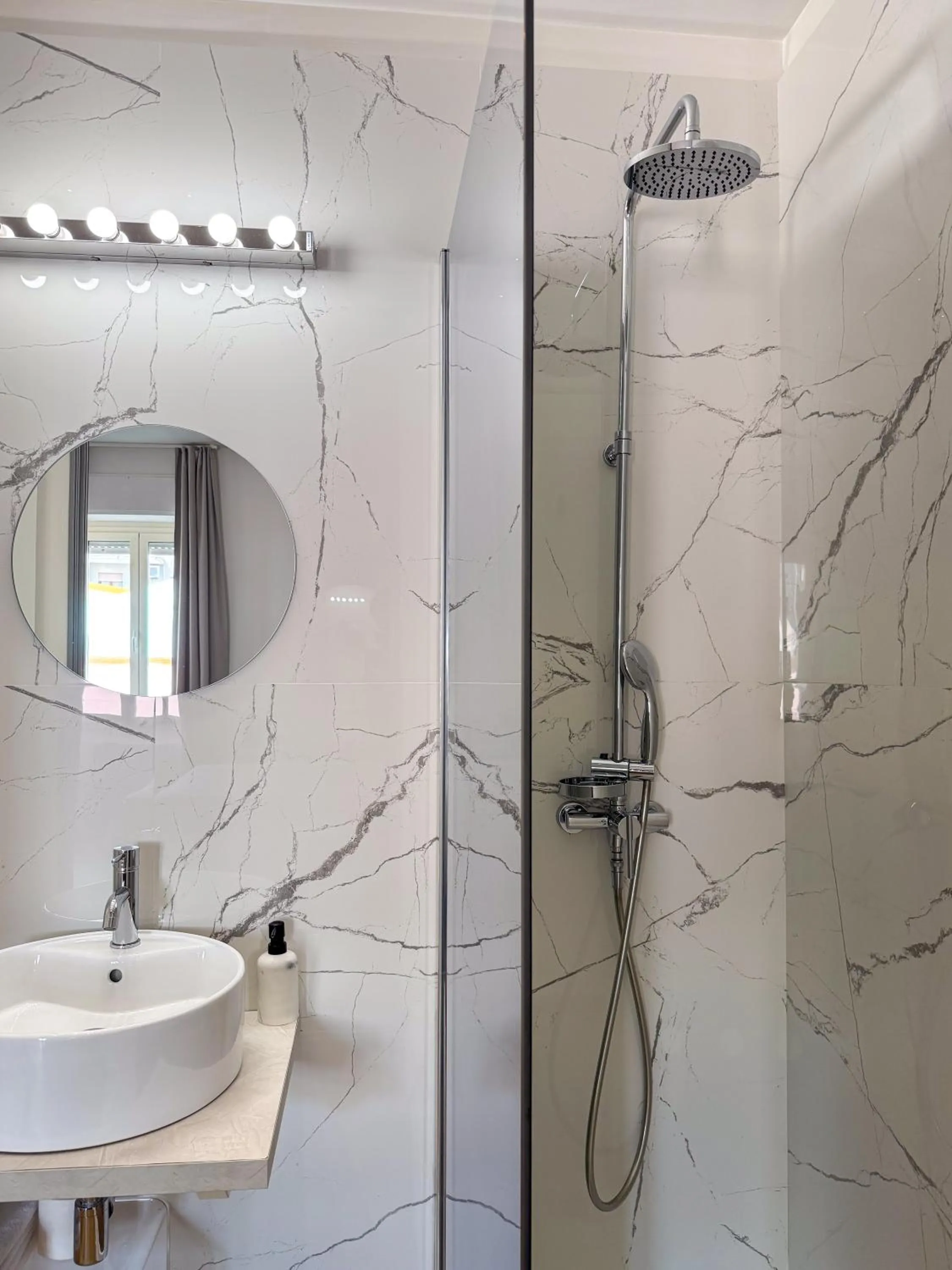 Shower in Album Boutique Rooms