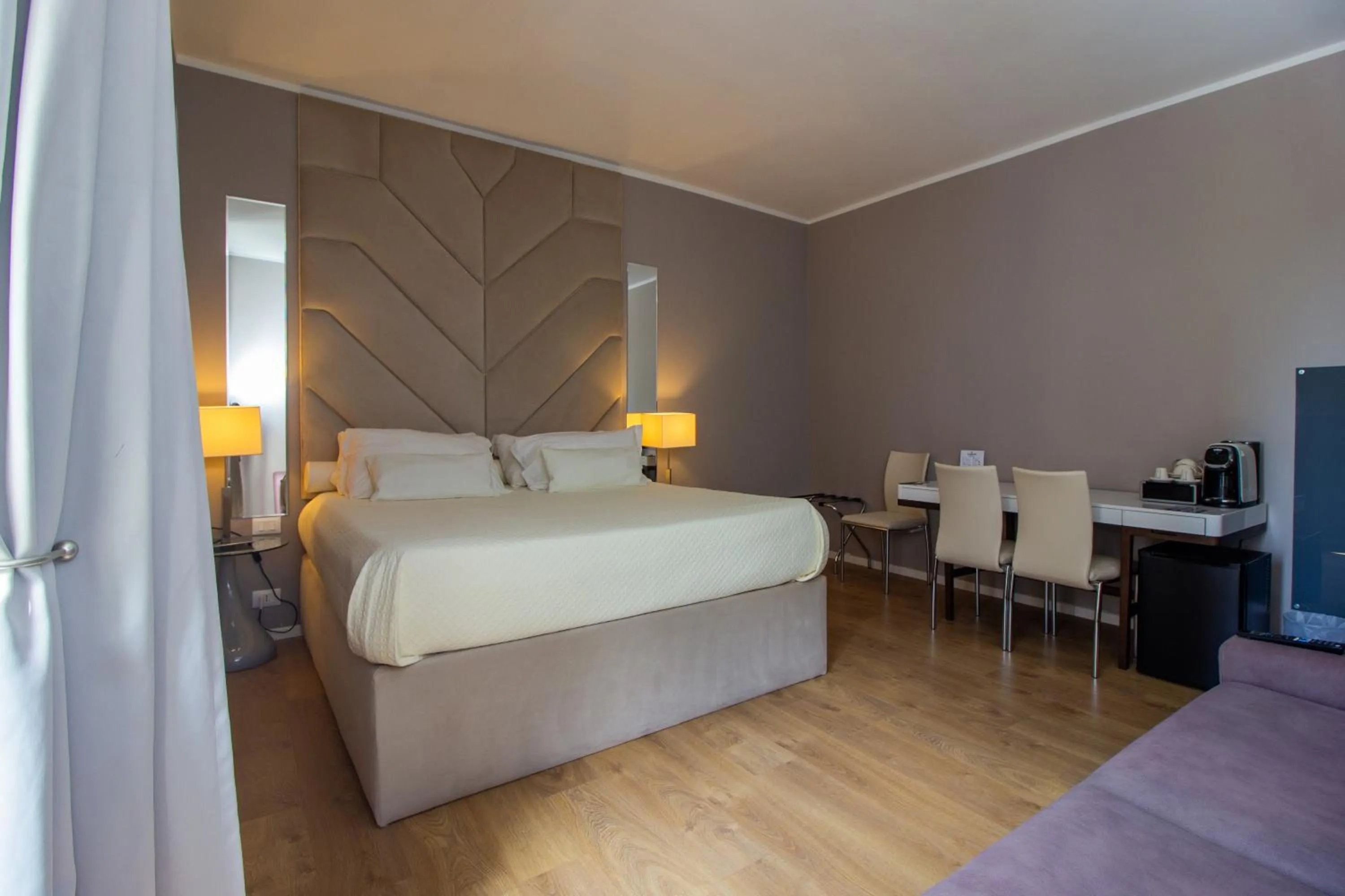 Photo of the whole room, Bed in Album Boutique Rooms