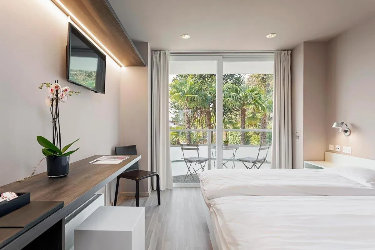 Bed in Jazz Hotel Ascona