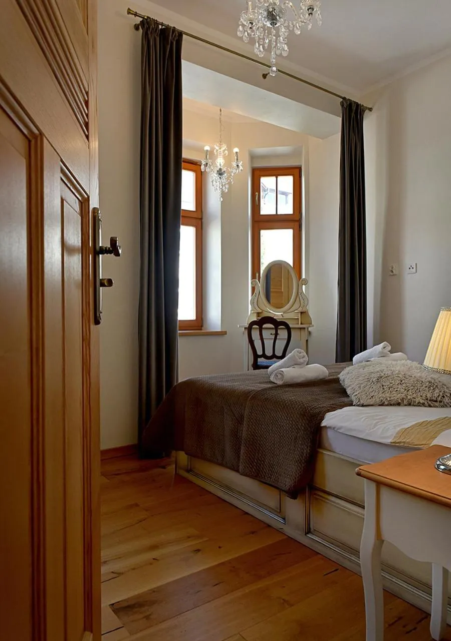 Bed in Dali ApartHOTEL