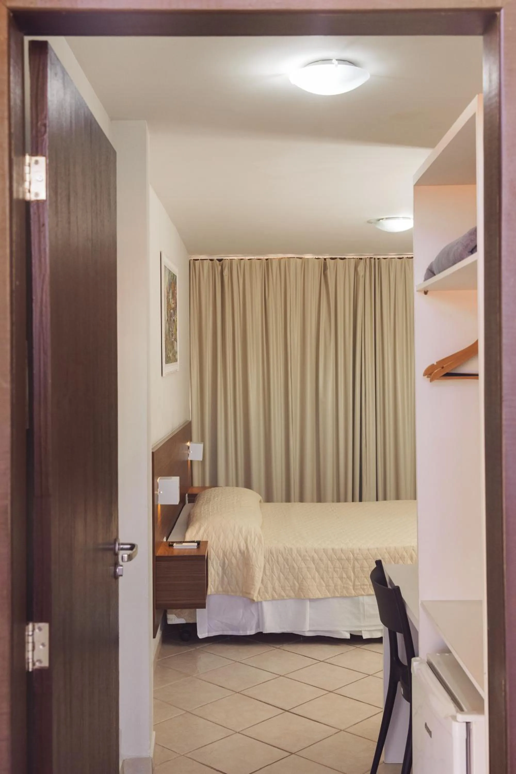 Bed in Pousada Laranja - Nova Administração