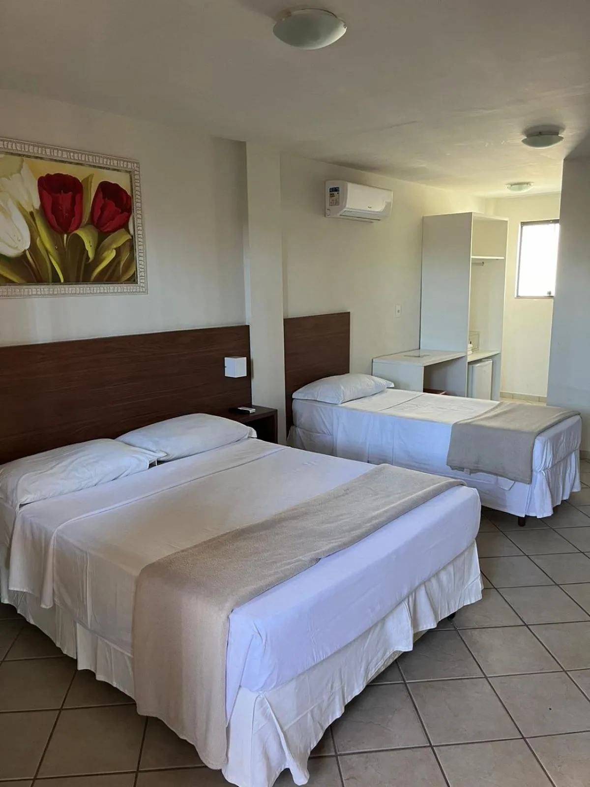 Bed in Pousada Laranja - Nova Administração