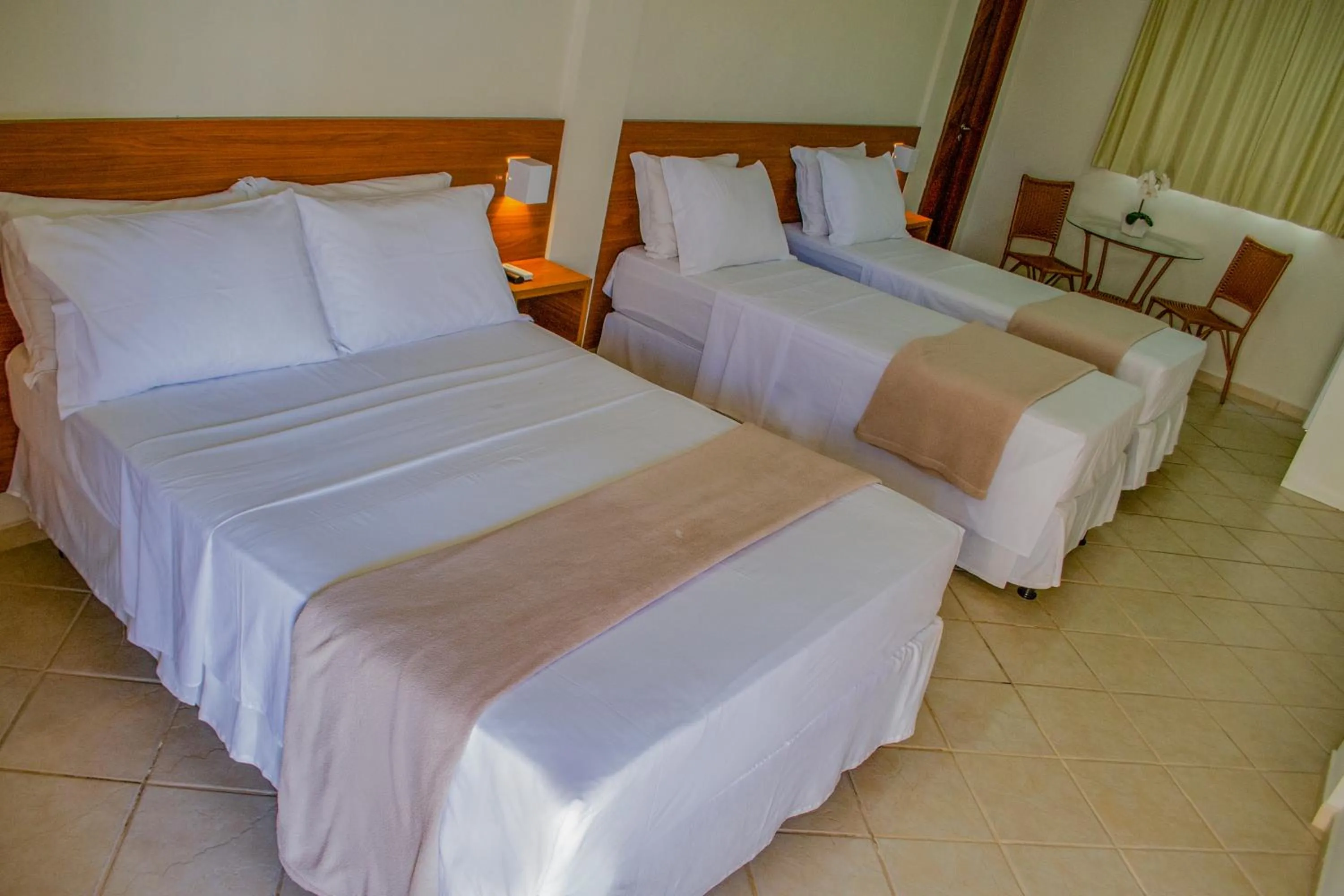 Bed in Pousada Laranja - Nova Administração