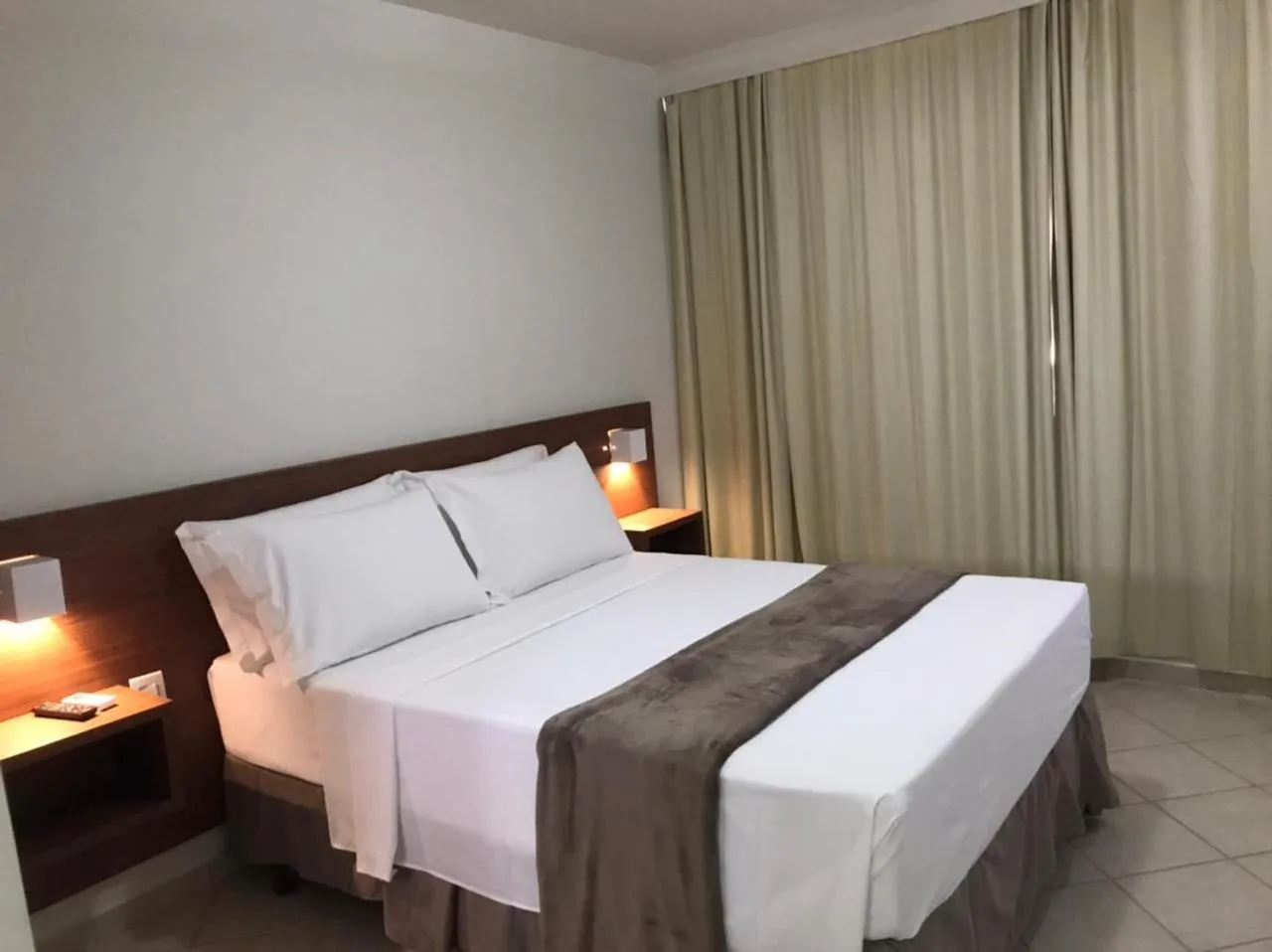 Bed in Pousada Laranja - Nova Administração