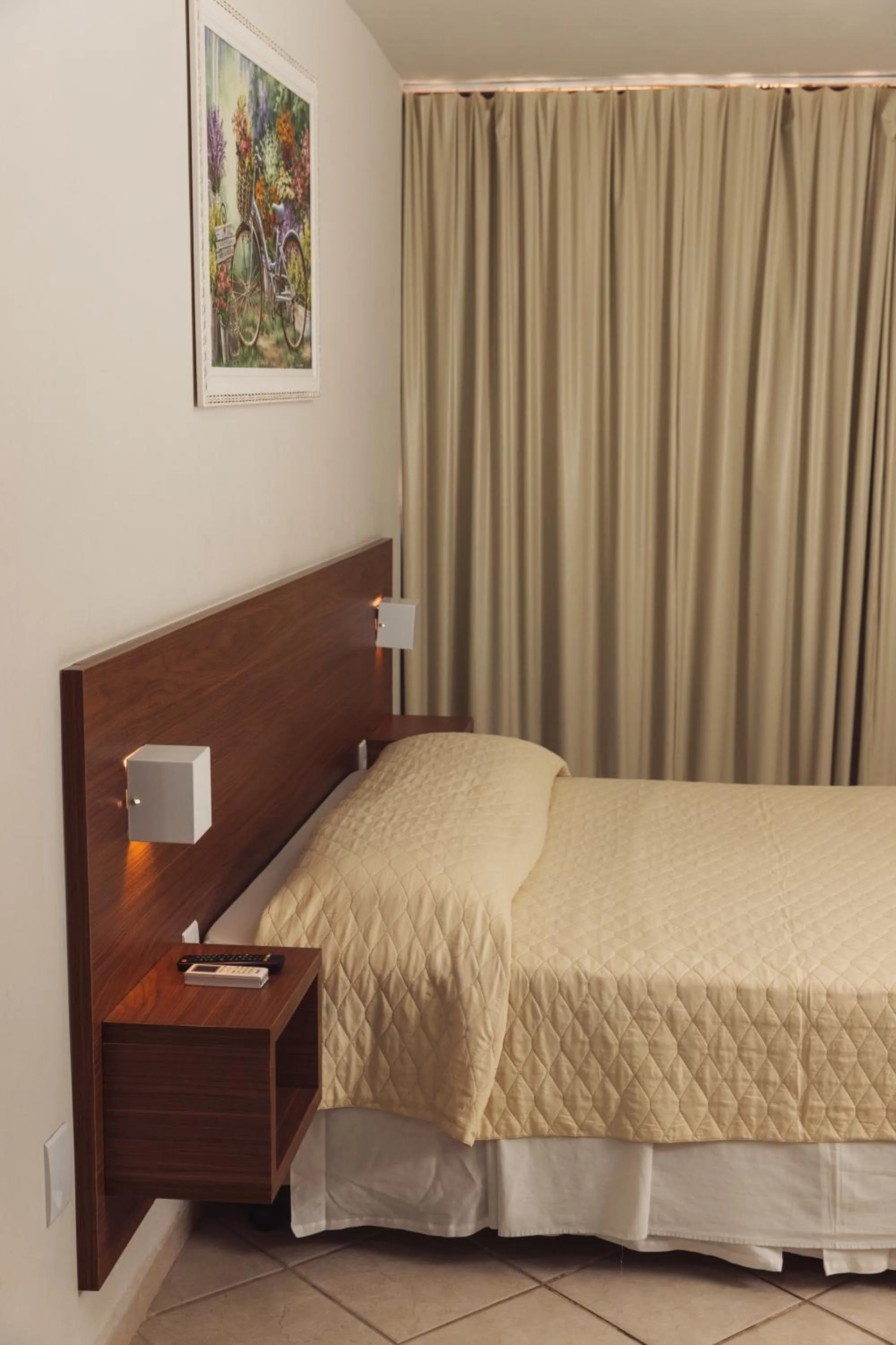 Bed in Pousada Laranja - Nova Administração