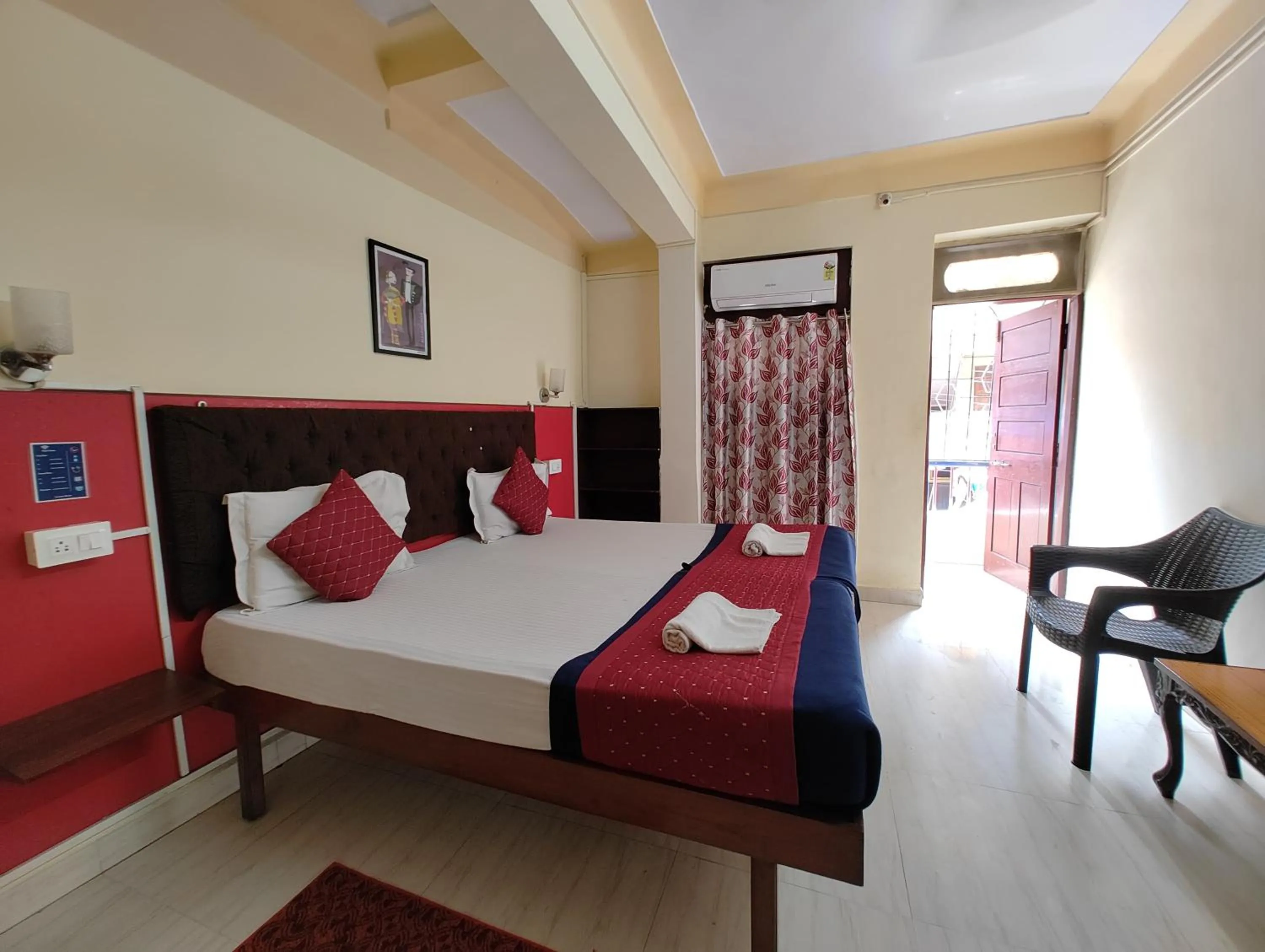 Bed in Sanman Hotels