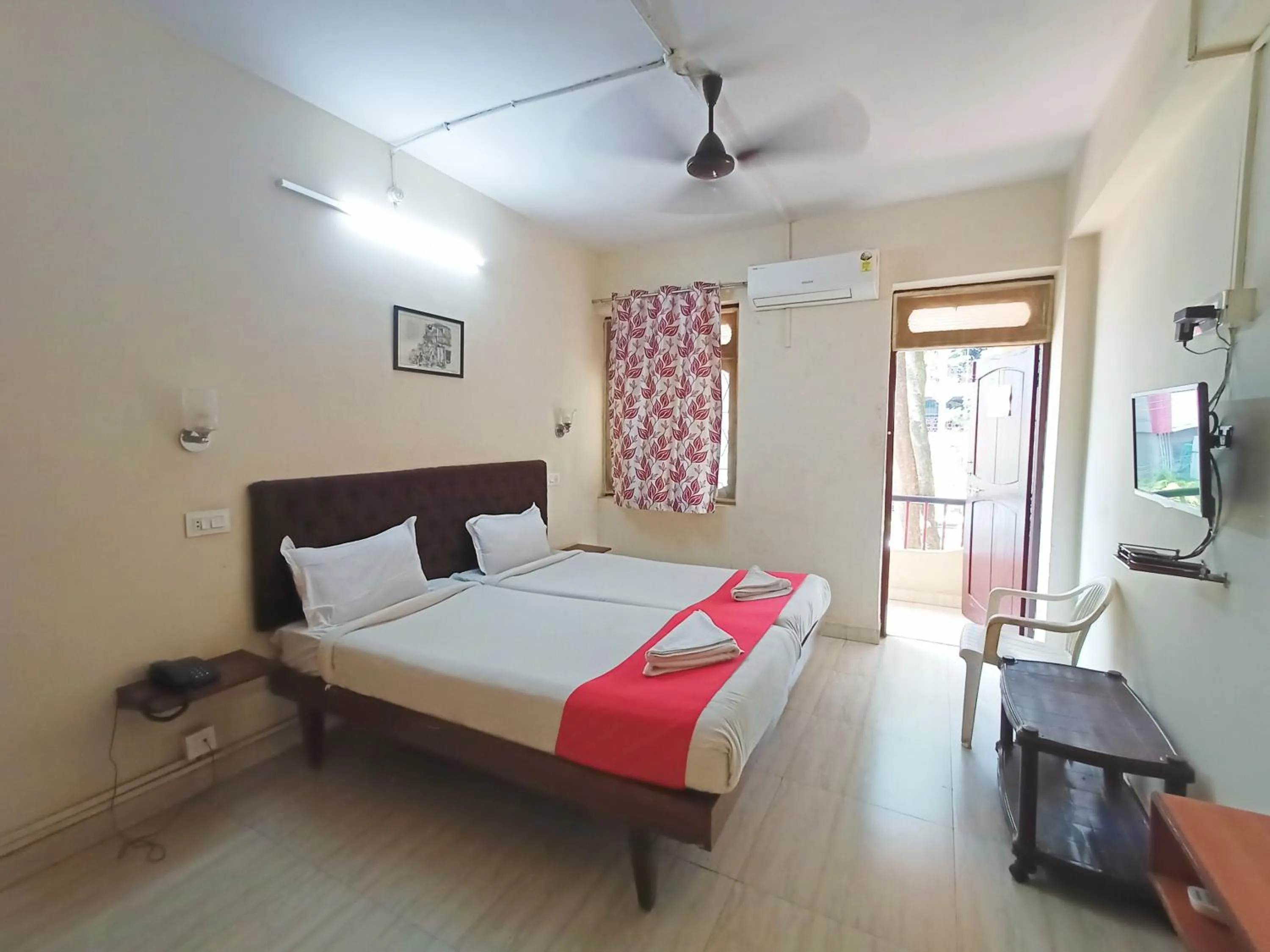 Bed in Sanman Hotels