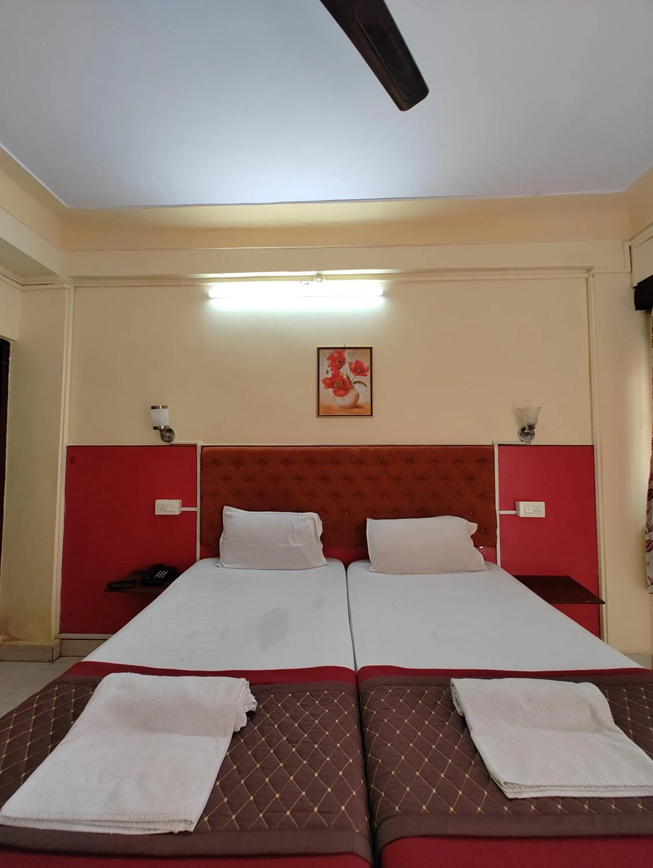 Bed in Sanman Hotels