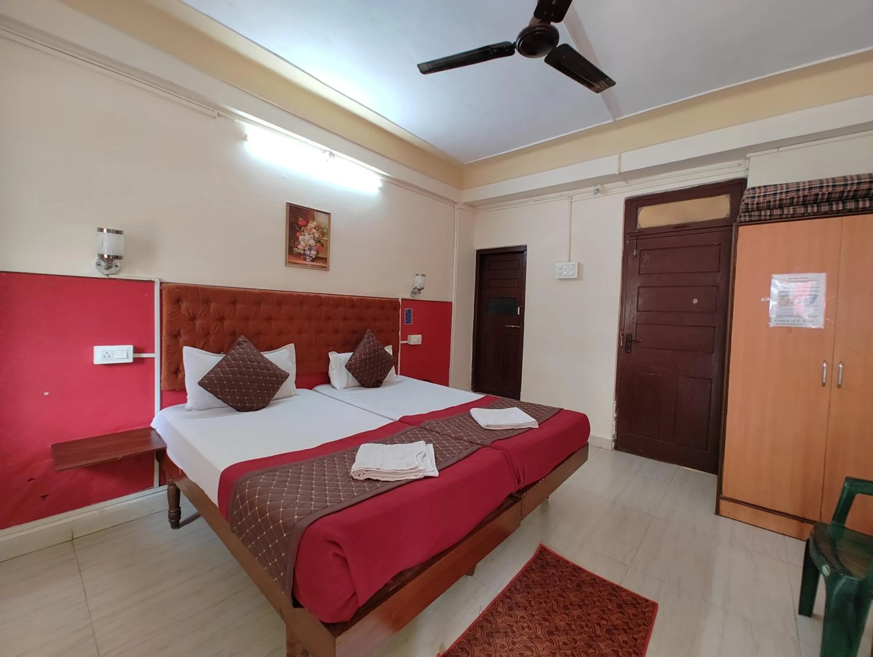 Bed in Sanman Hotels
