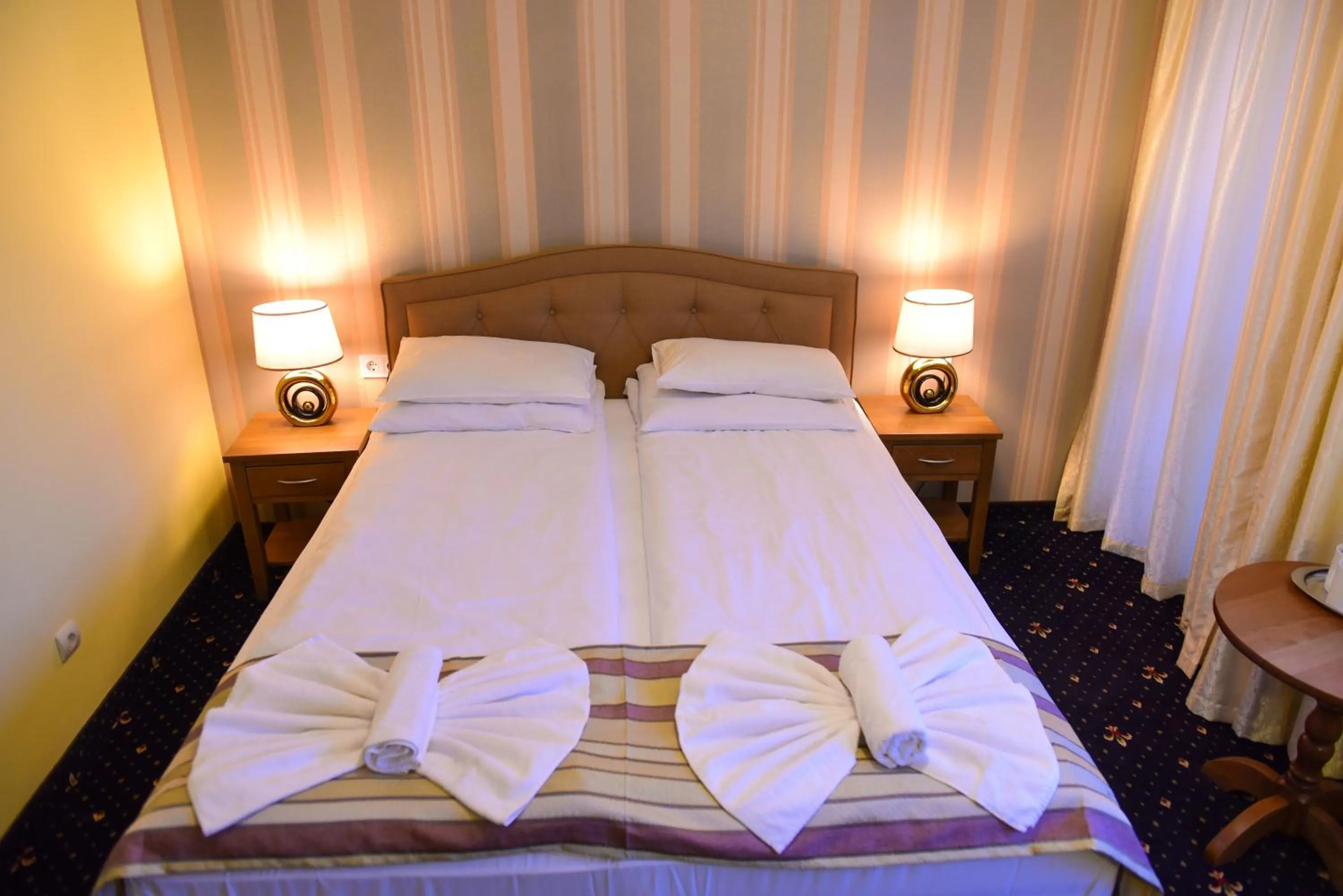 Bed in Family Hotel Lazur