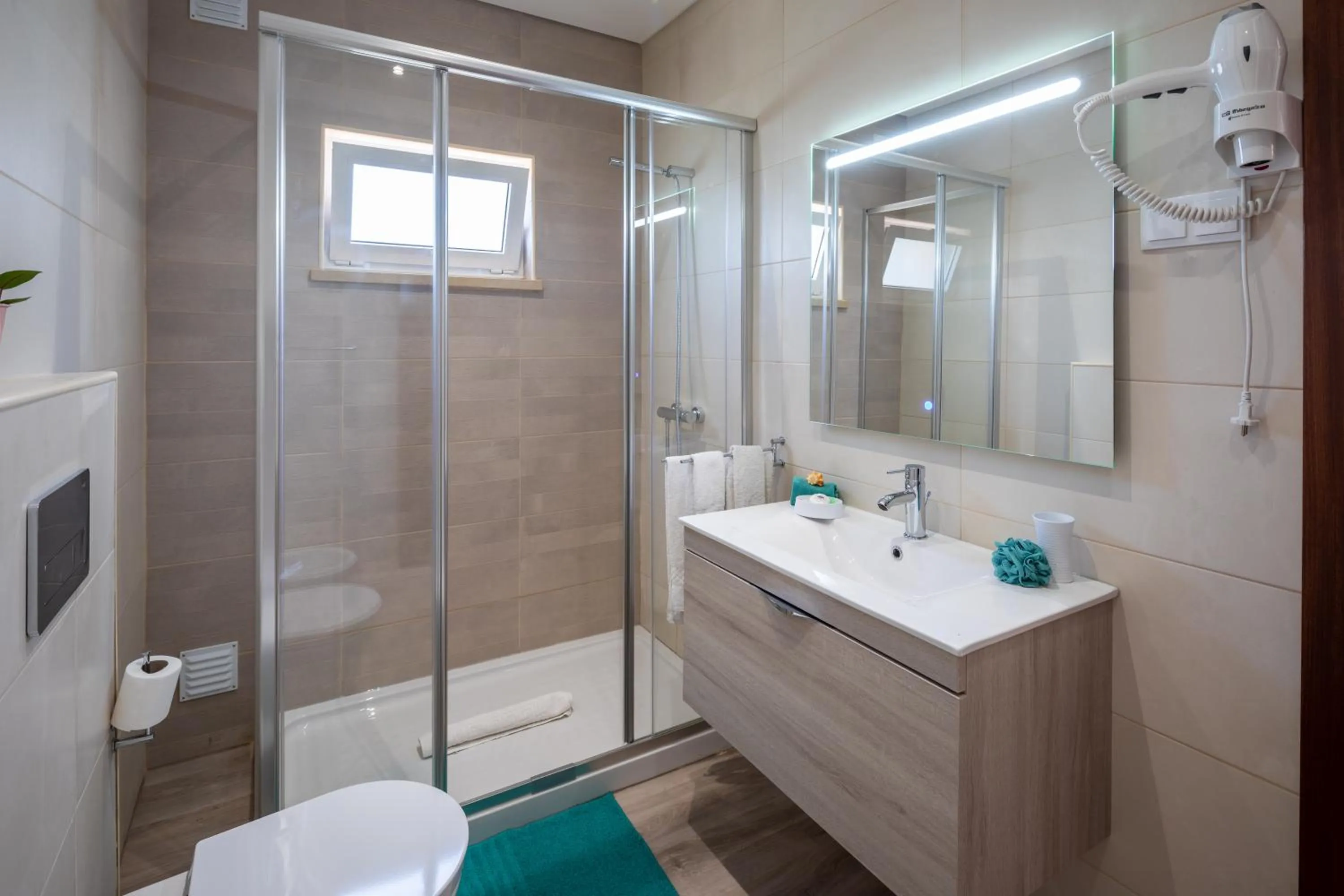 Shower in Apartamentos Flor da Laranja, Albufeira by AlgarveBlossom