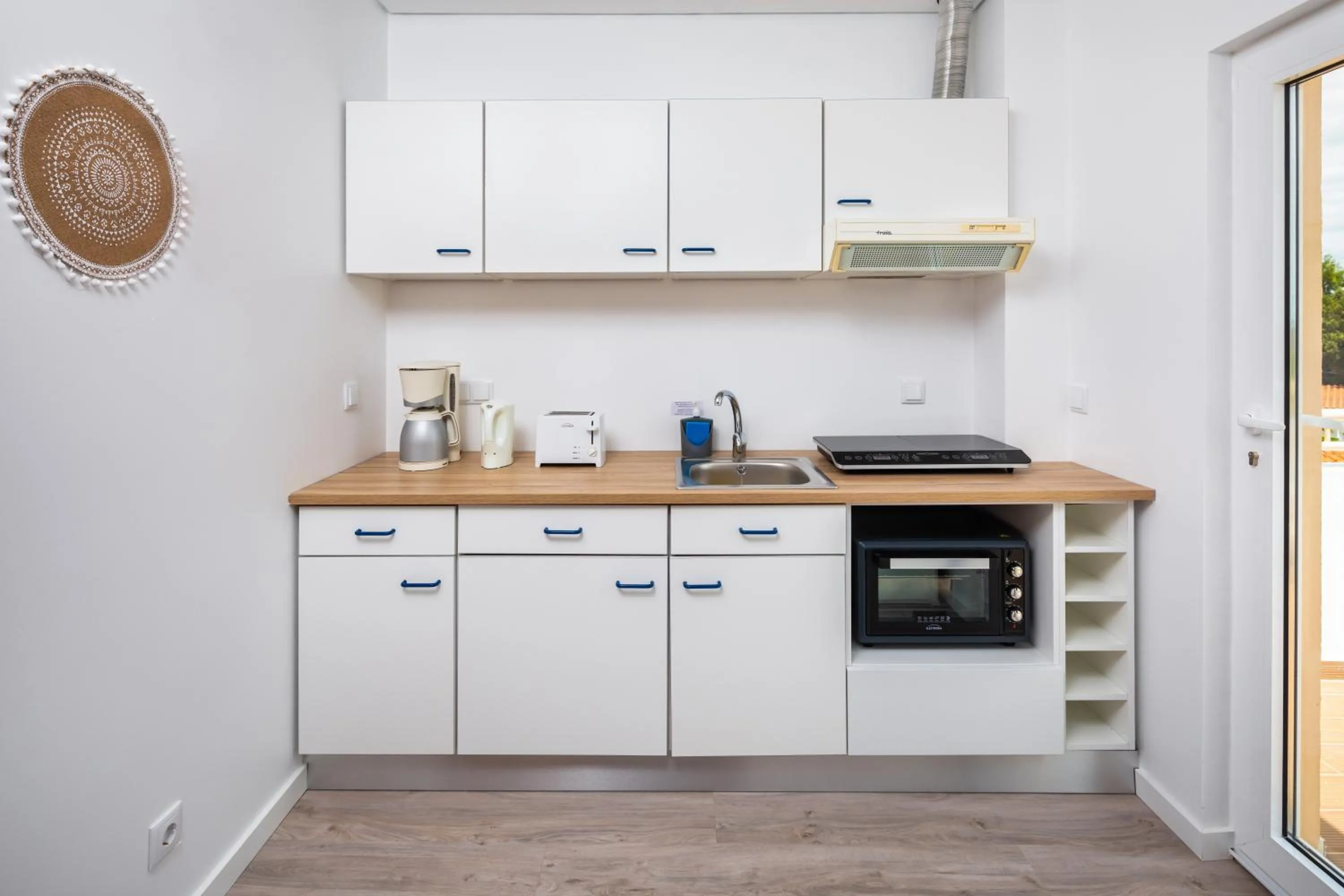 Kitchen or kitchenette in Apartamentos Flor da Laranja, Albufeira by AlgarveBlossom