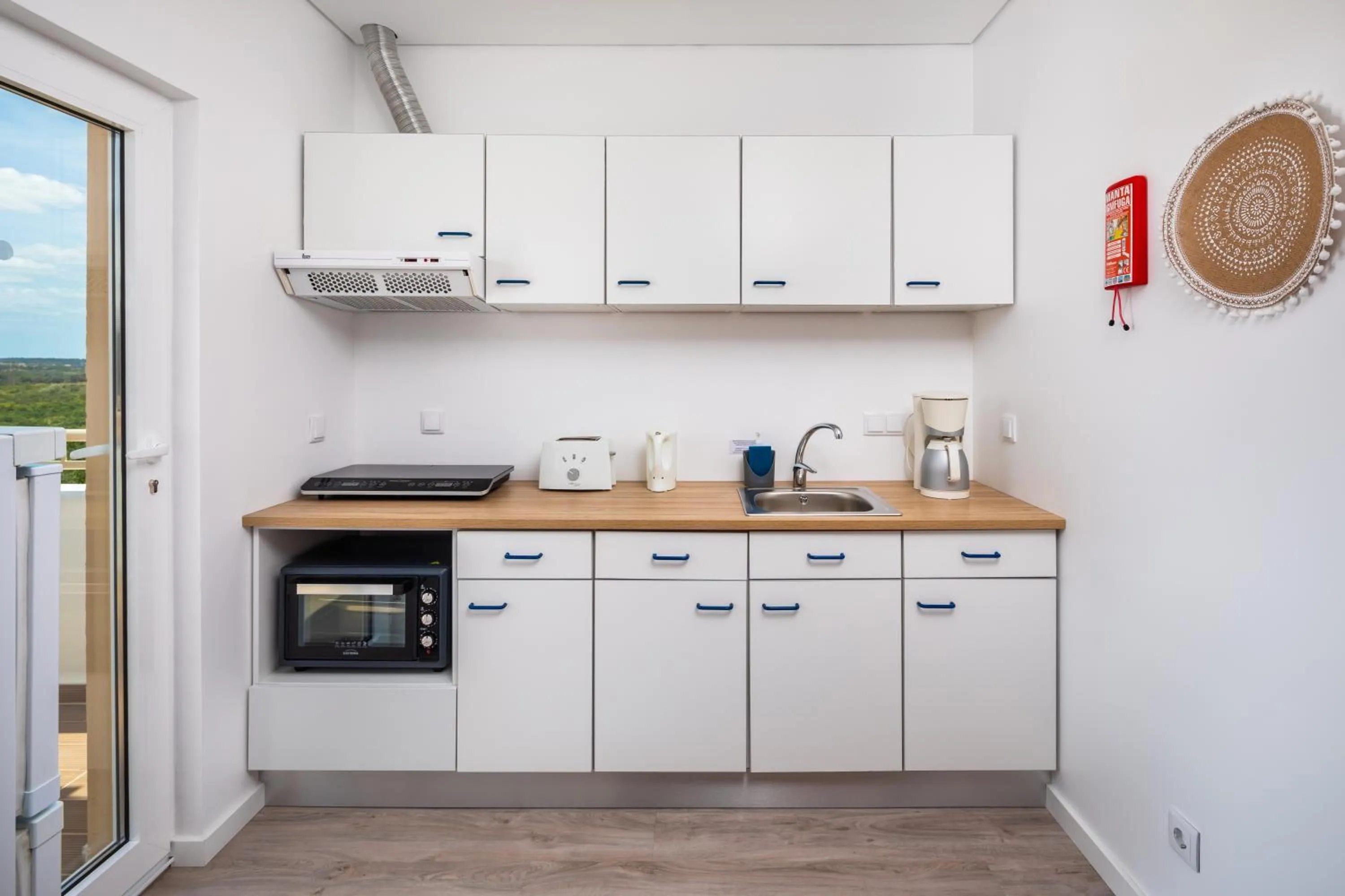 Kitchen or kitchenette in Apartamentos Flor da Laranja, Albufeira by AlgarveBlossom
