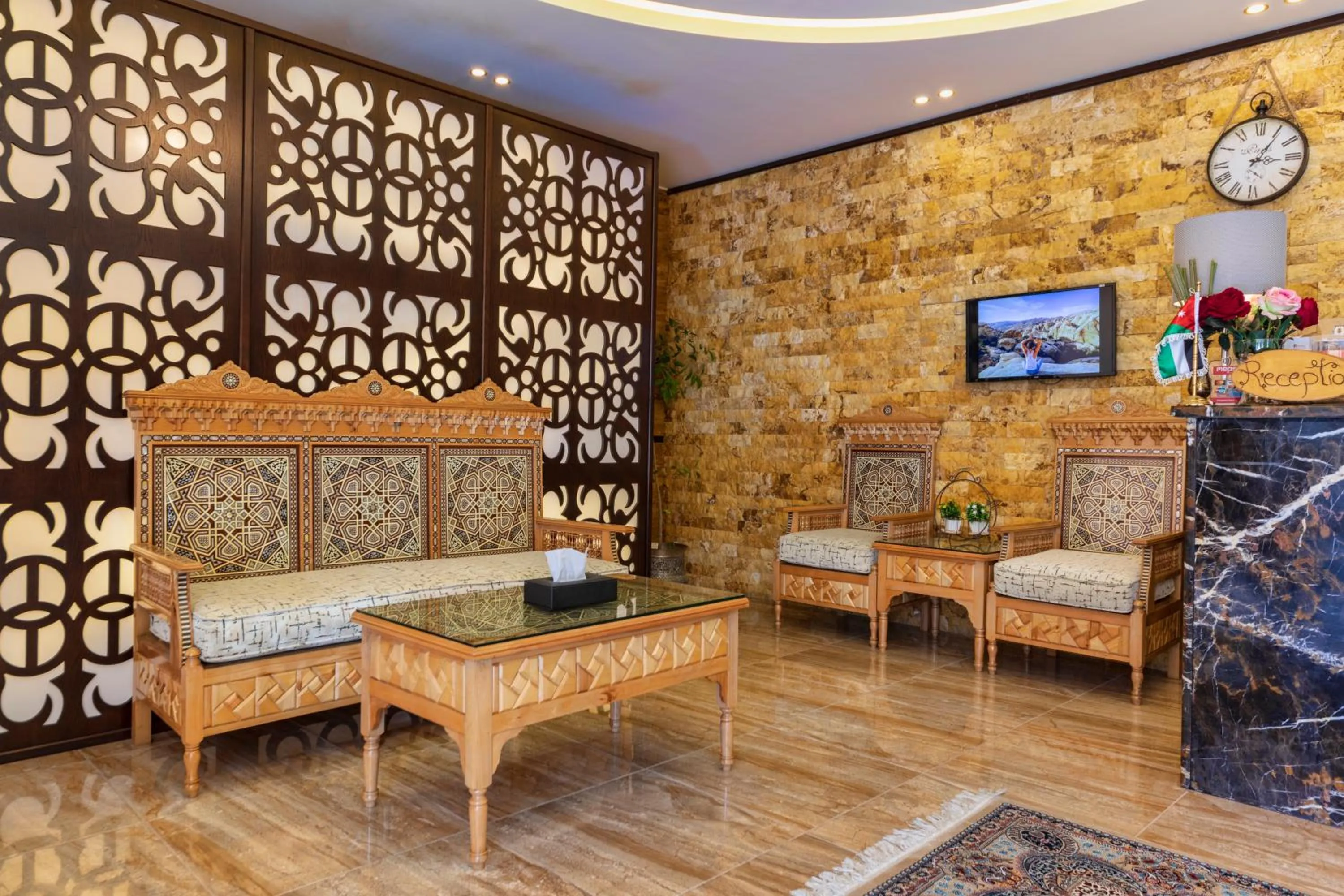 Communal lounge/ TV room in Town Season Hotel