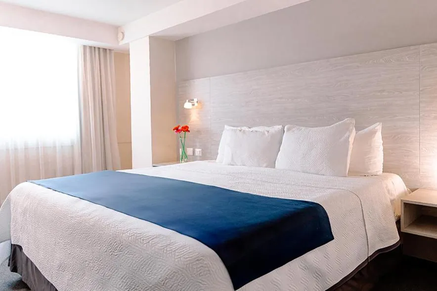 Bed in Kasa Hotel & Suites