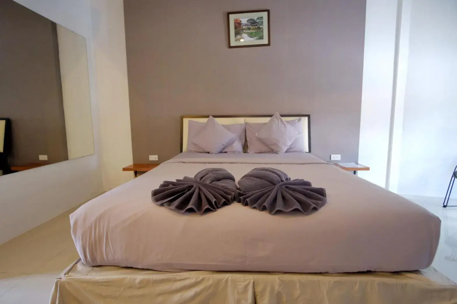 Bed in At Lamai Resort Bed in At Lamai Resort