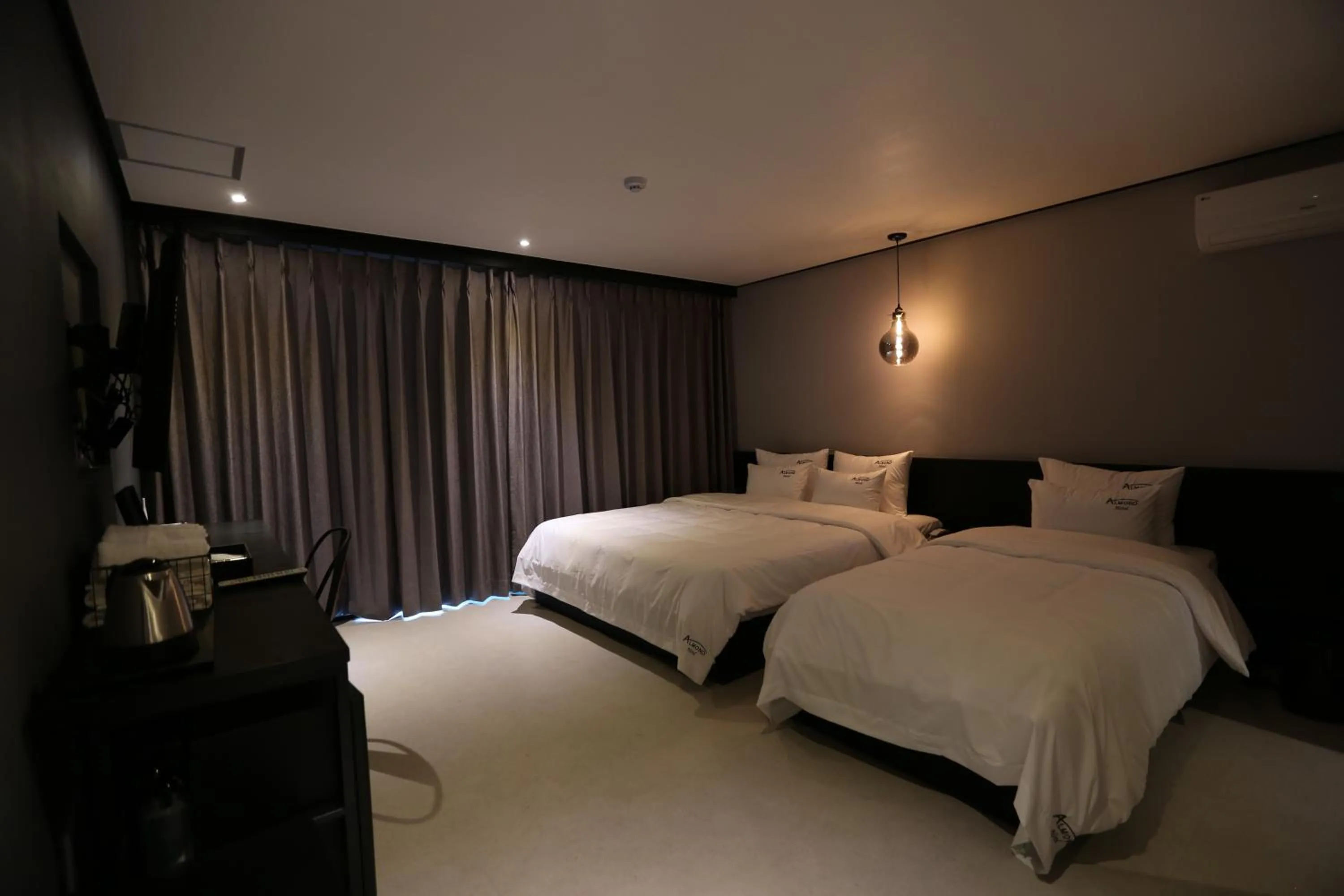 almond hotel Gupo station