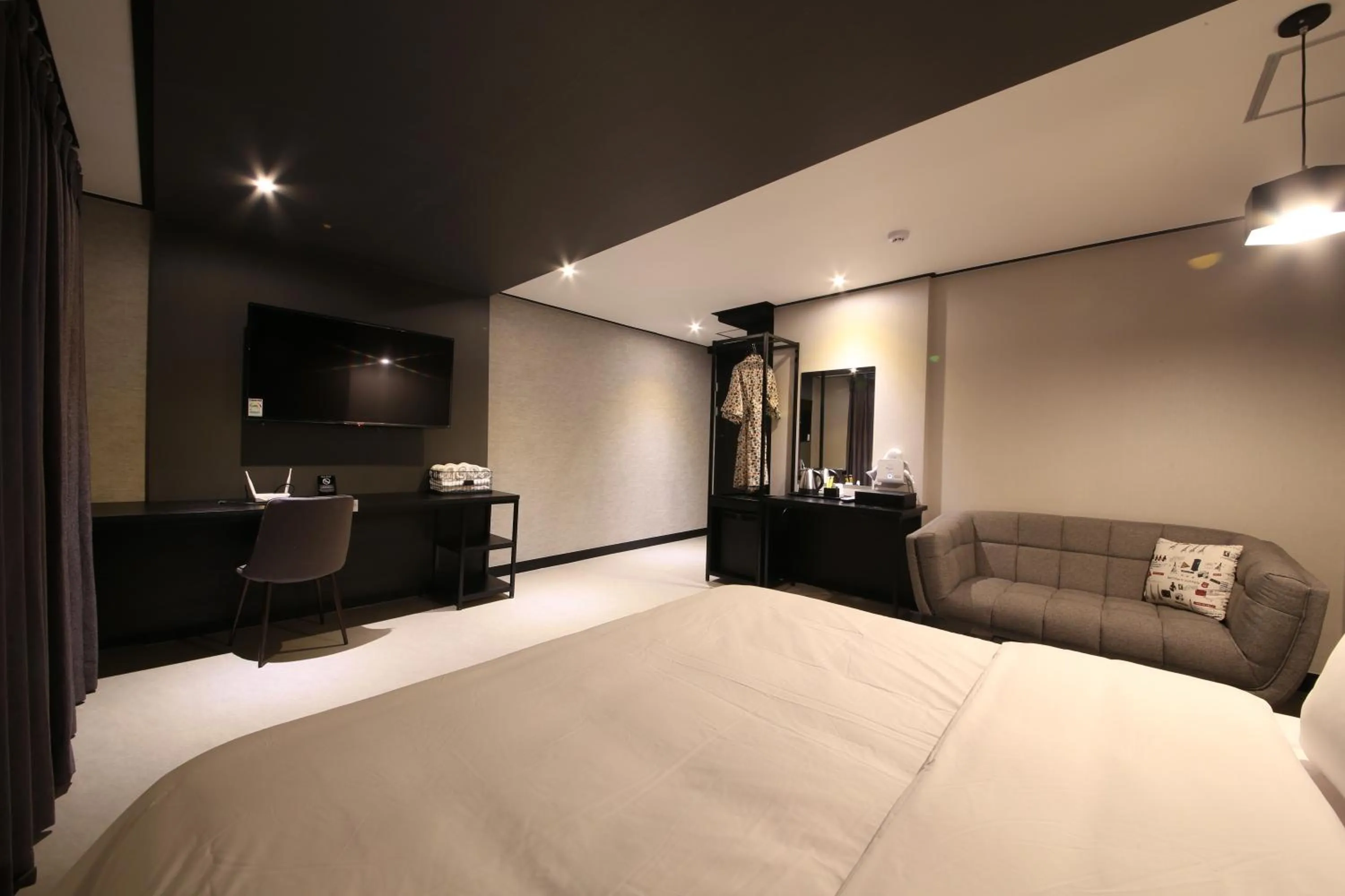 TV/Entertainment Center in almond hotel Gupo station