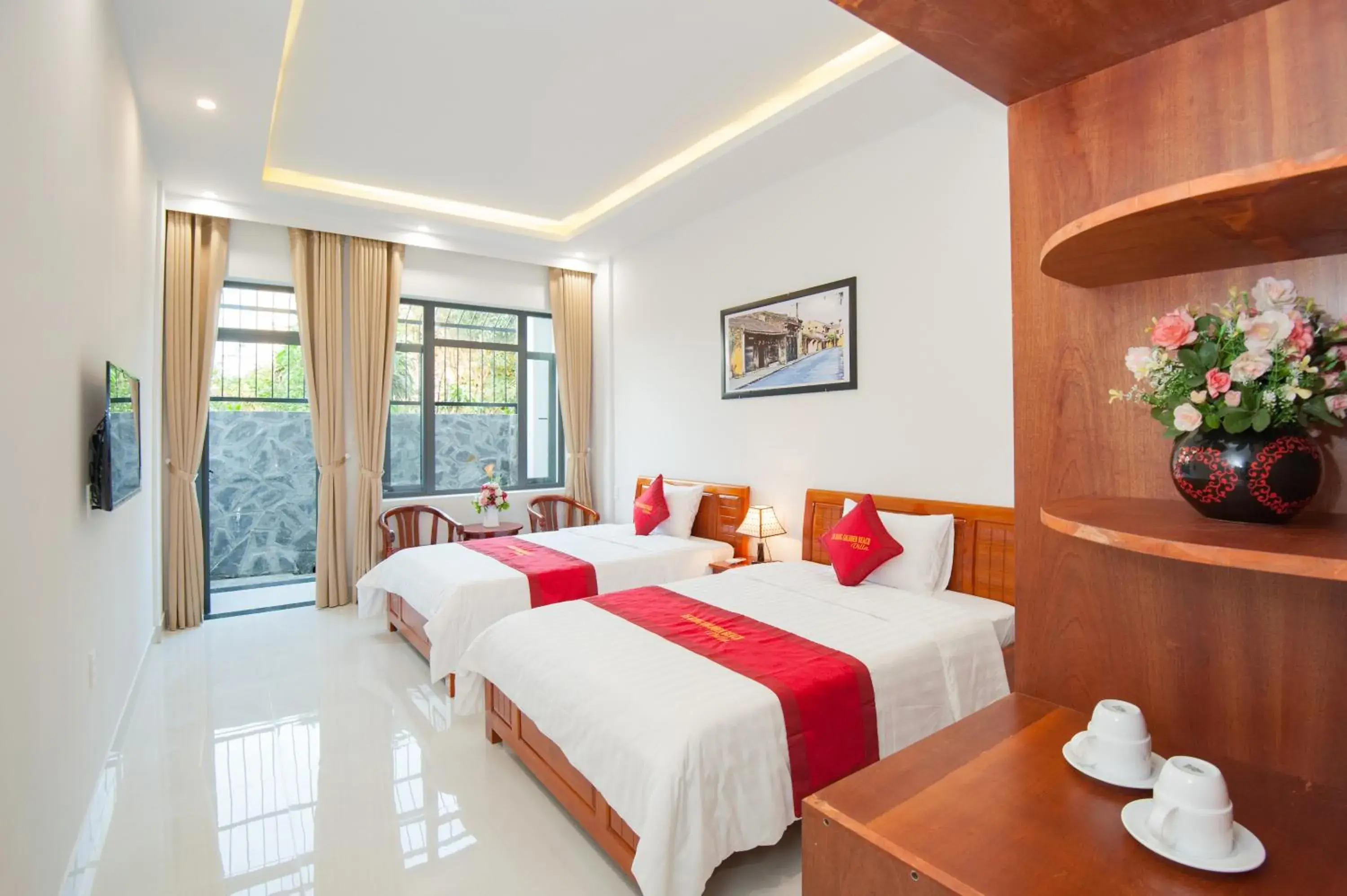Family Room with Balcony in An Bang Golden Beach Villa Family Room with Balcony in An Bang Golden Beach Villa