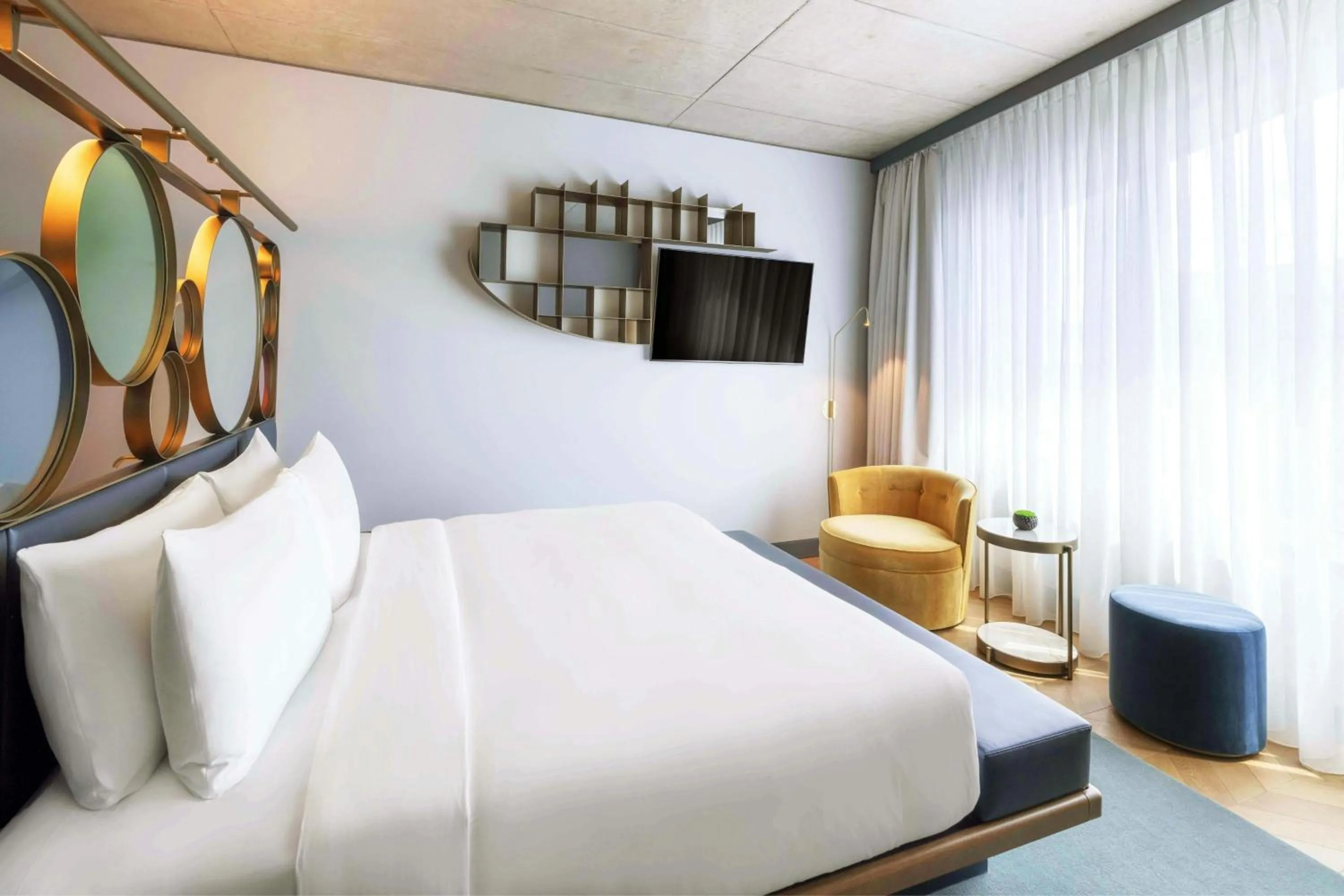 Photo of the whole room, Bed in W Prague