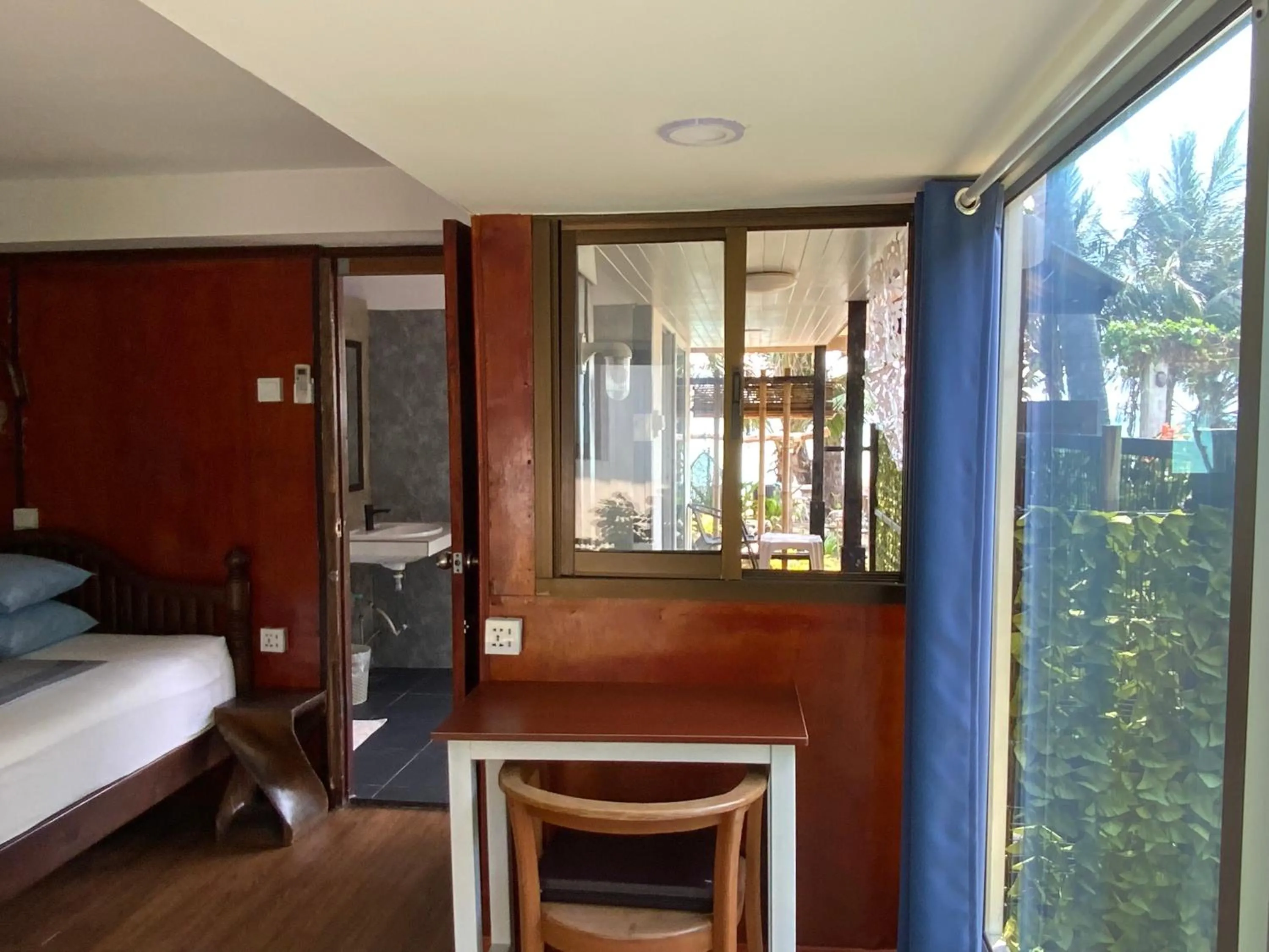 Bed in Sunrise Bungalow