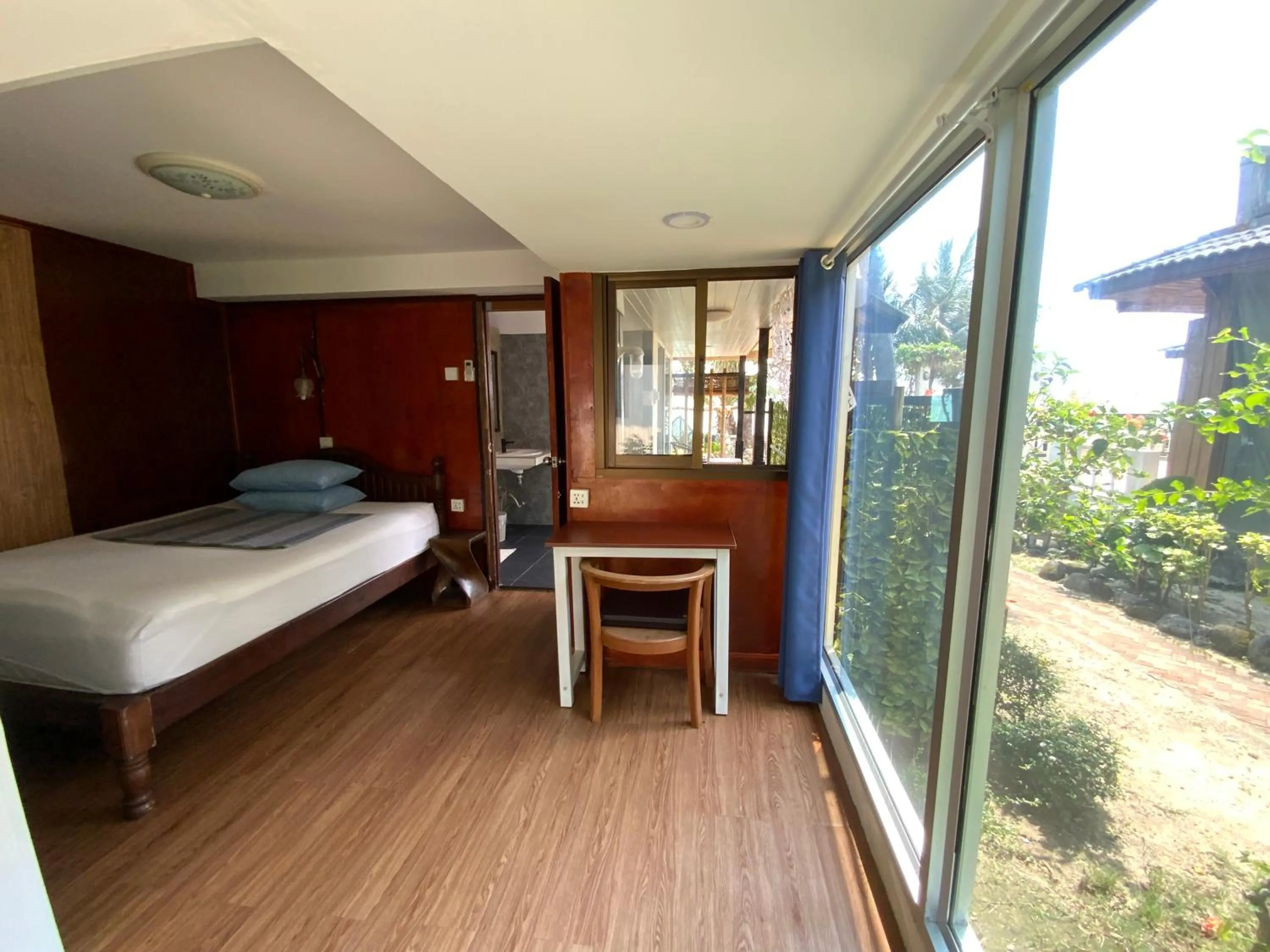 Bed in Sunrise Bungalow