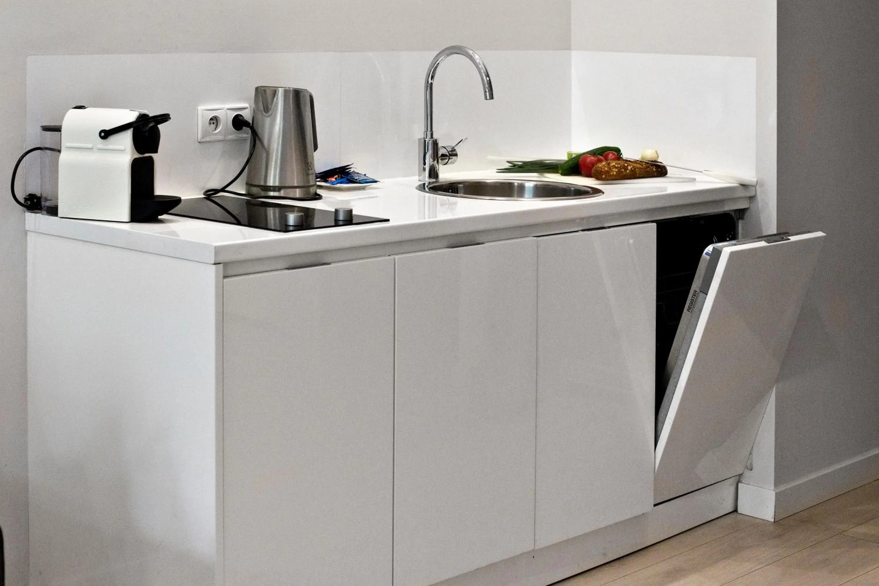 Kitchen or kitchenette in P&O Giełdowa Serviced Apartments