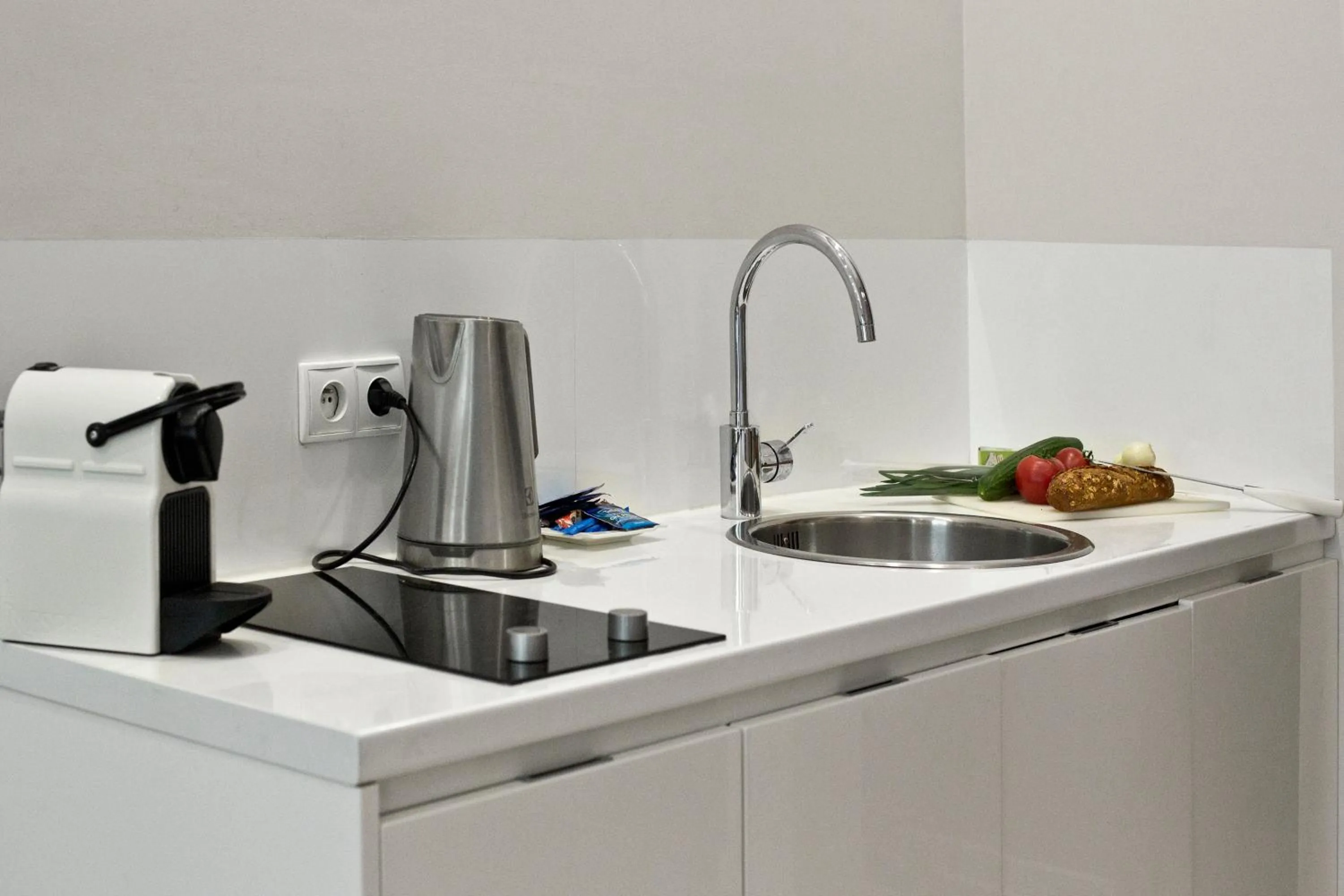 Kitchen or kitchenette in P&O Giełdowa Serviced Apartments
