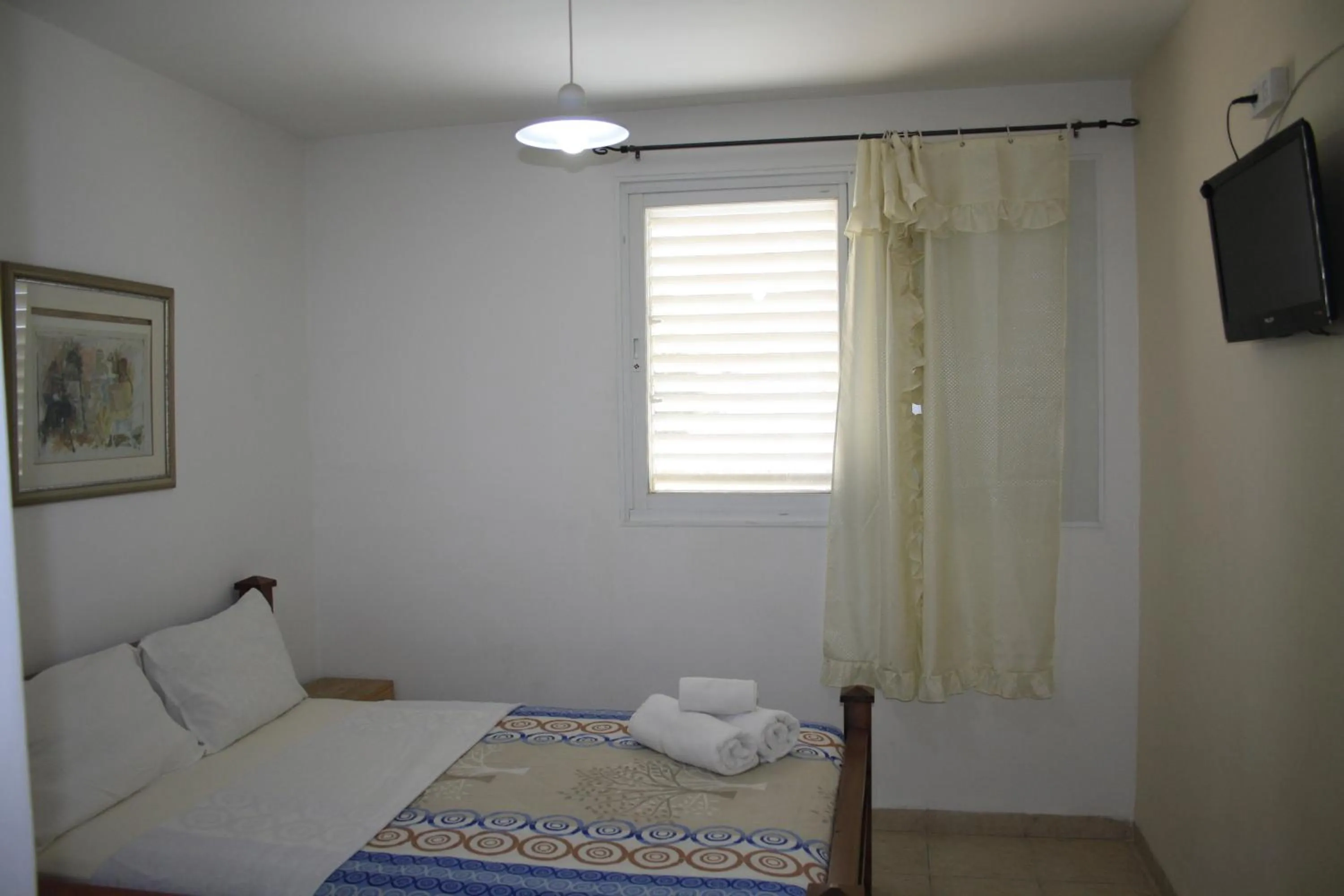 Bed in Ga'aton Motel