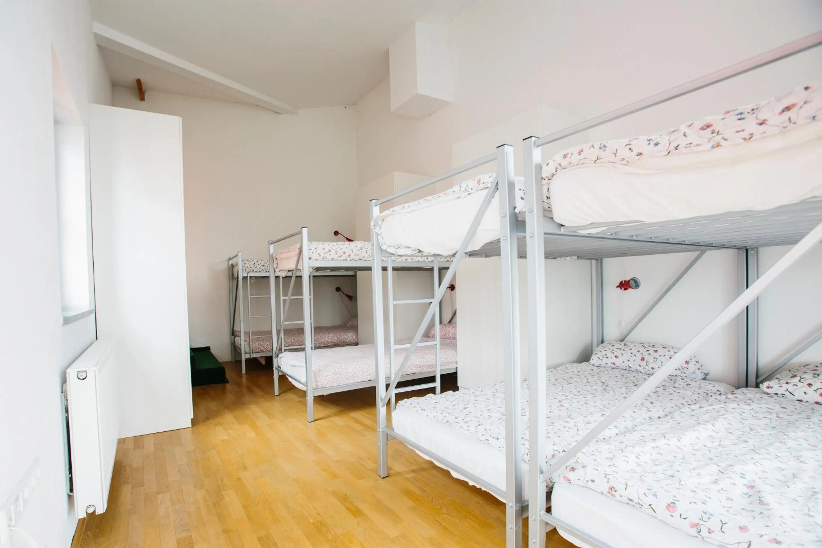 Bed in Cukrarna Guest Accommodation