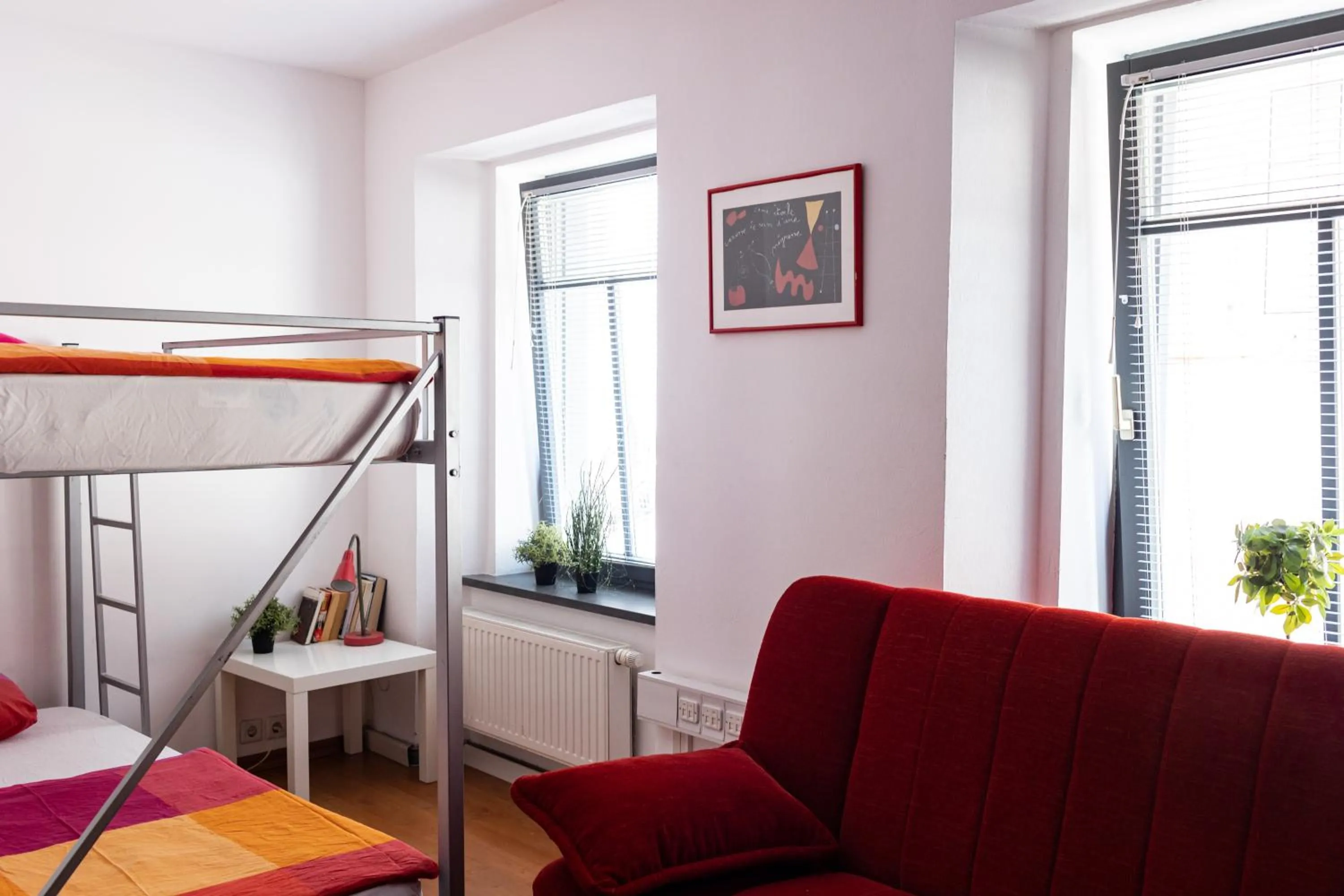 Bed in Cukrarna Guest Accommodation