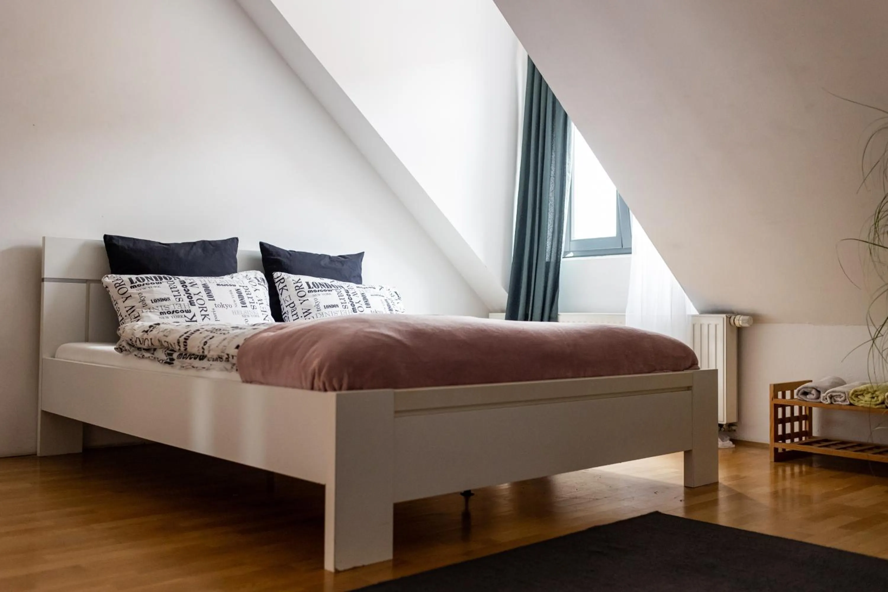 Bed in Cukrarna Guest Accommodation