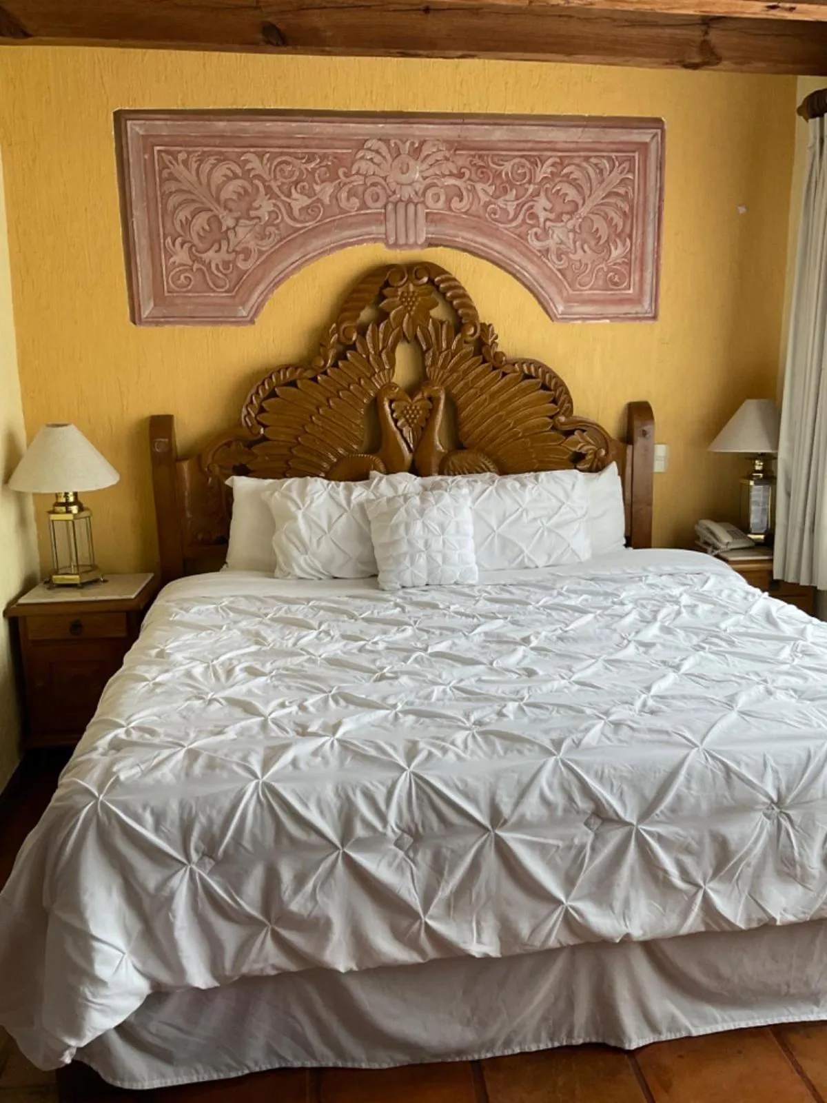 Bed in Villa San Jose Hotel & Suites
