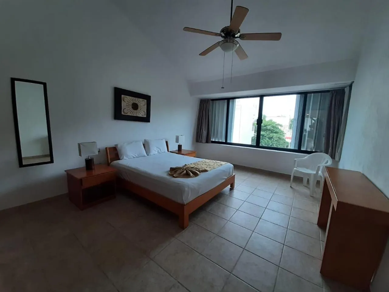 Bed in Villas Mayaluum Cozumel