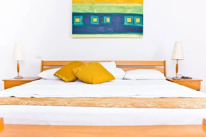 Bed in Villas Mayaluum Cozumel