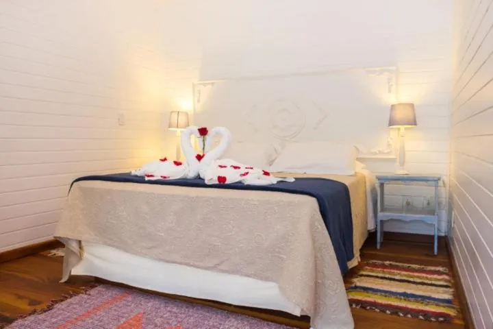 Bed in Pousada Solar D'Araucaria