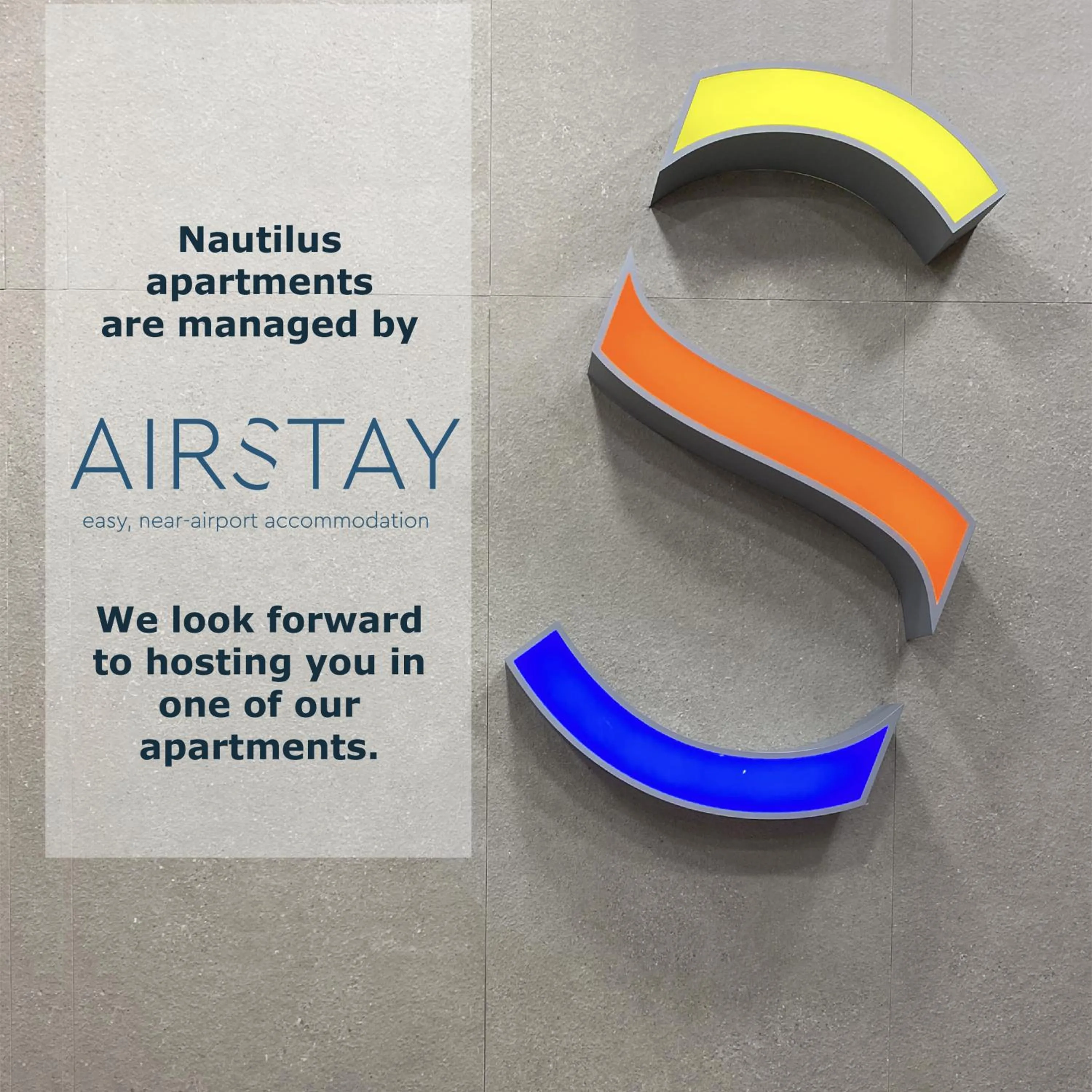 Property logo or sign in Nautilus Apartments Airport by Airstay