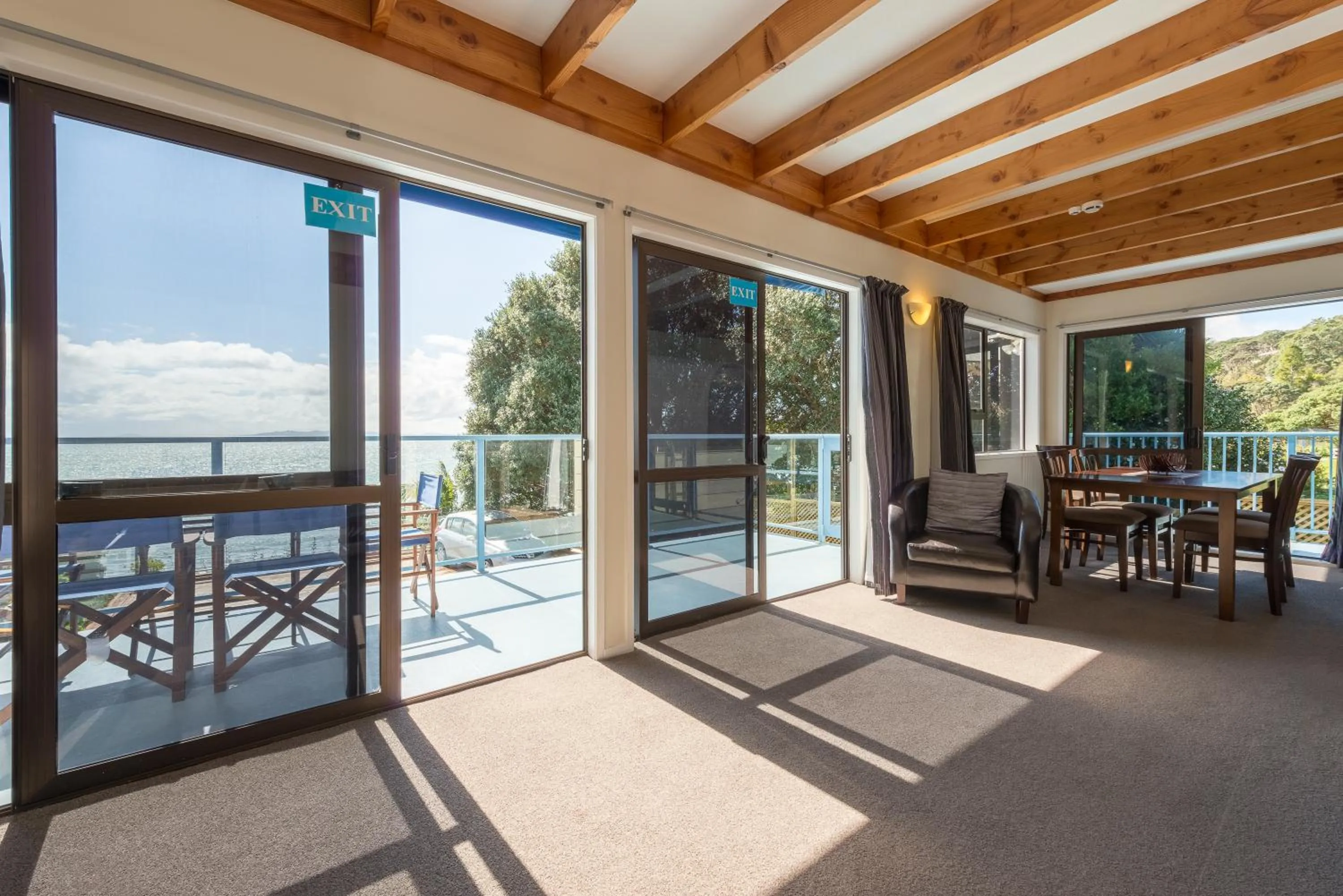 Dining area in By the Bay Beachfront Apartments