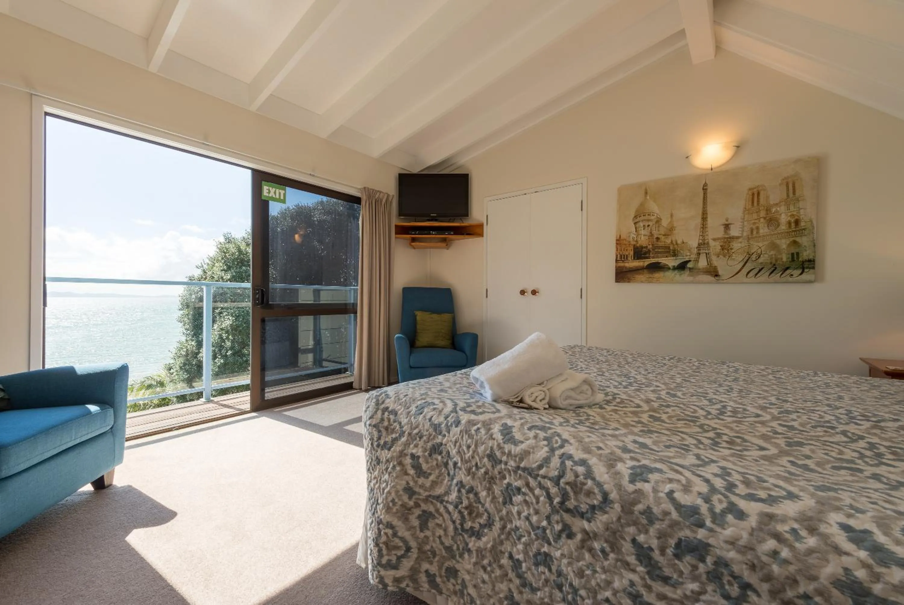 Photo of the whole room, Bed in By the Bay Beachfront Apartments