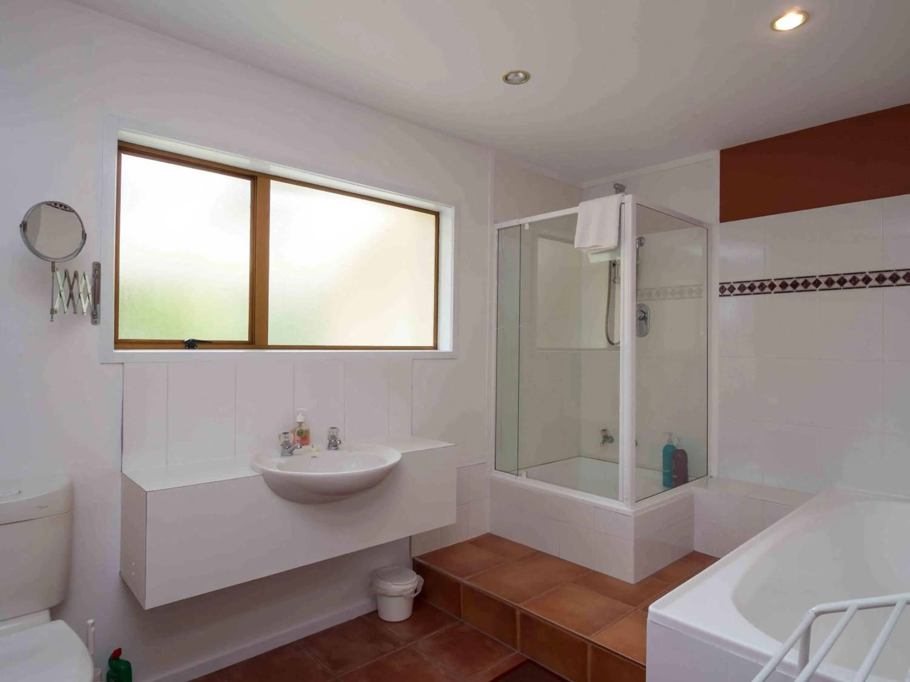 Bathroom in By the Bay Beachfront Apartments