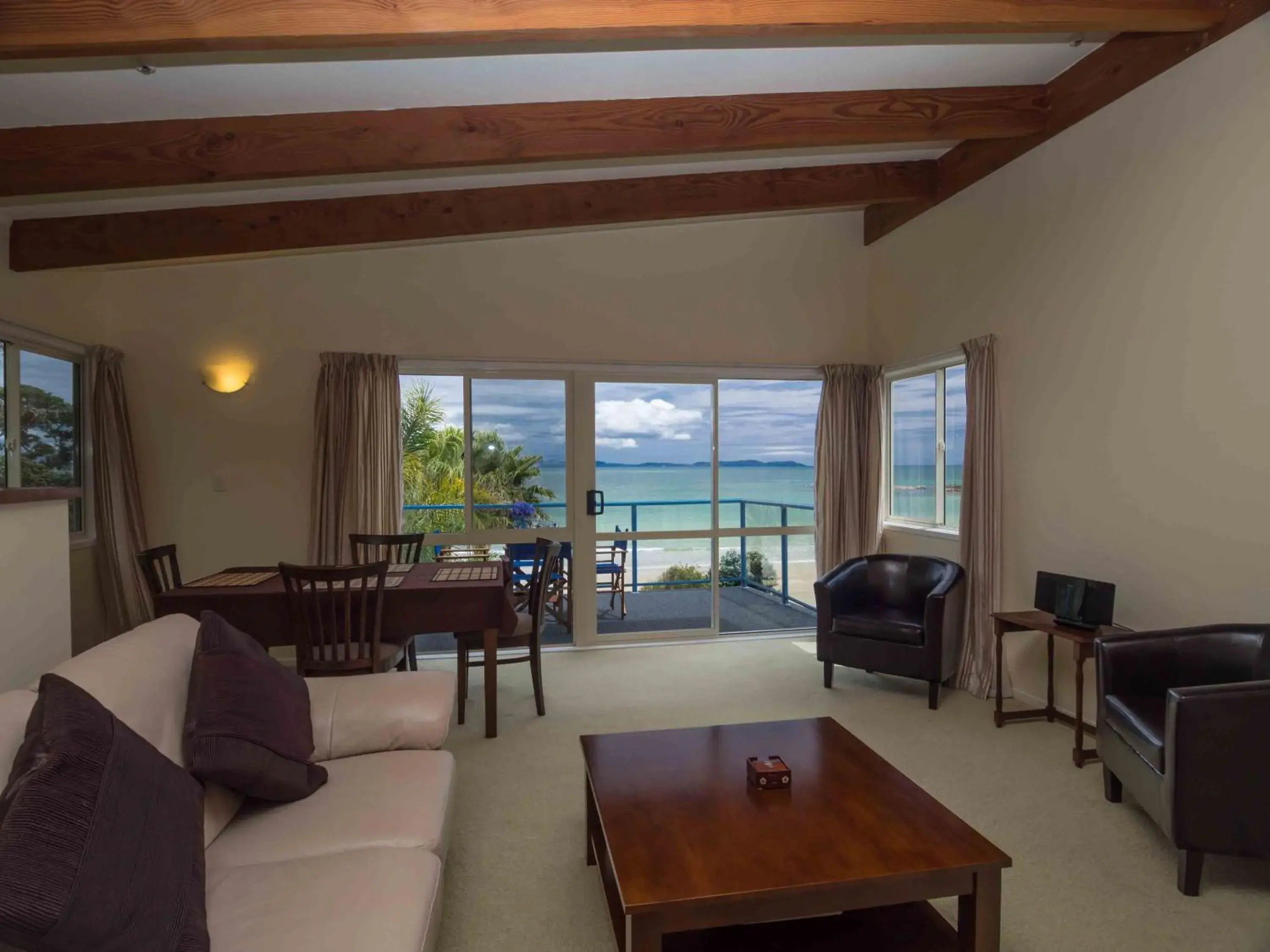 Living room in By the Bay Beachfront Apartments Living room in By the Bay Beachfront Apartments