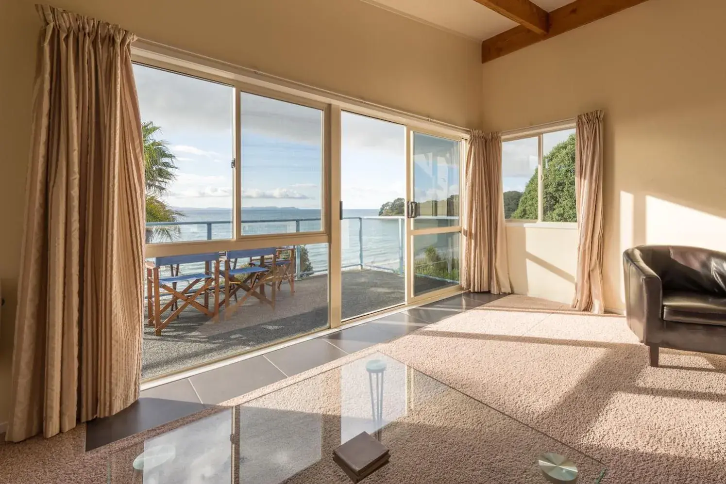 Living room in By the Bay Beachfront Apartments Living room in By the Bay Beachfront Apartments