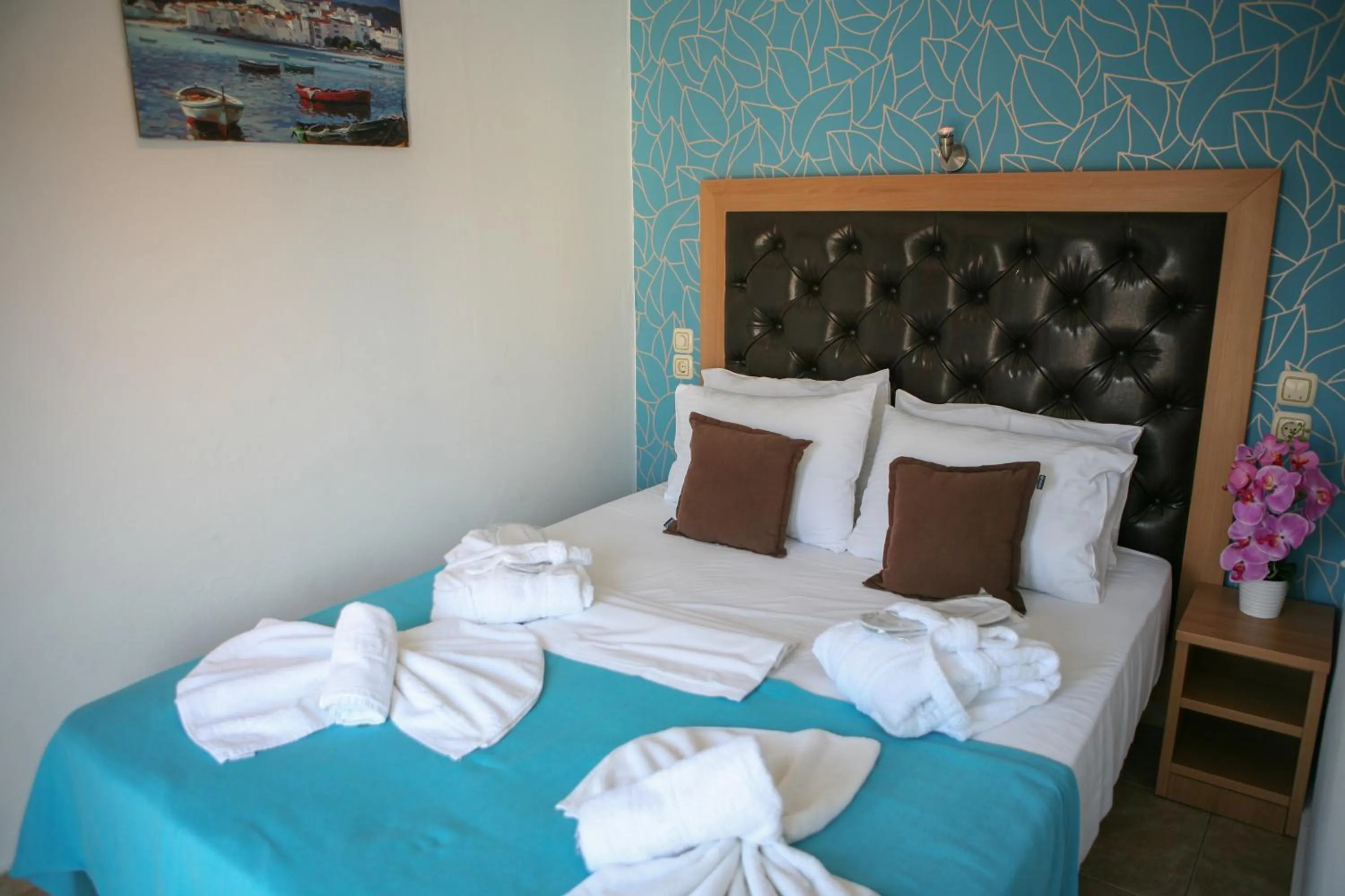 Bed in Hotel Karagianni