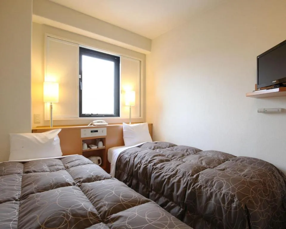 Bed in AZ Inn Handa Inter